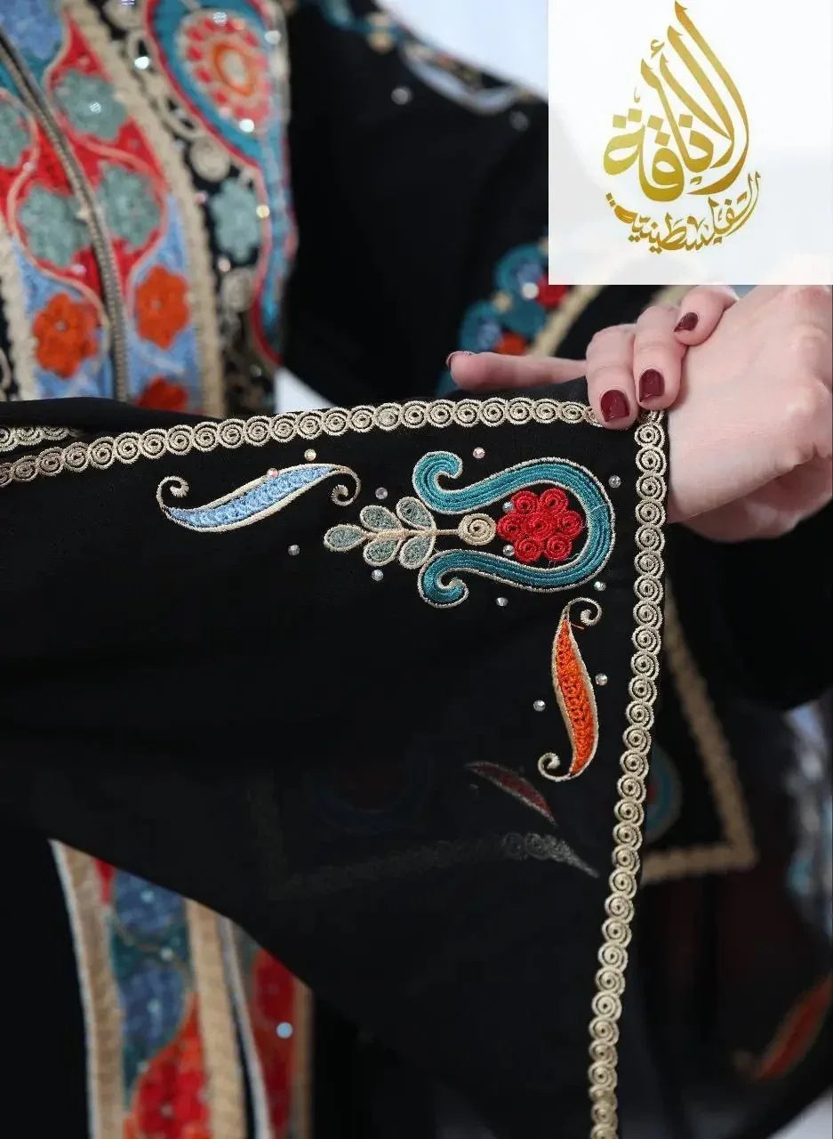 Black Malaki embroidered kaftan sleeve with intricate colorful Palestinian embroidery and decorative trim