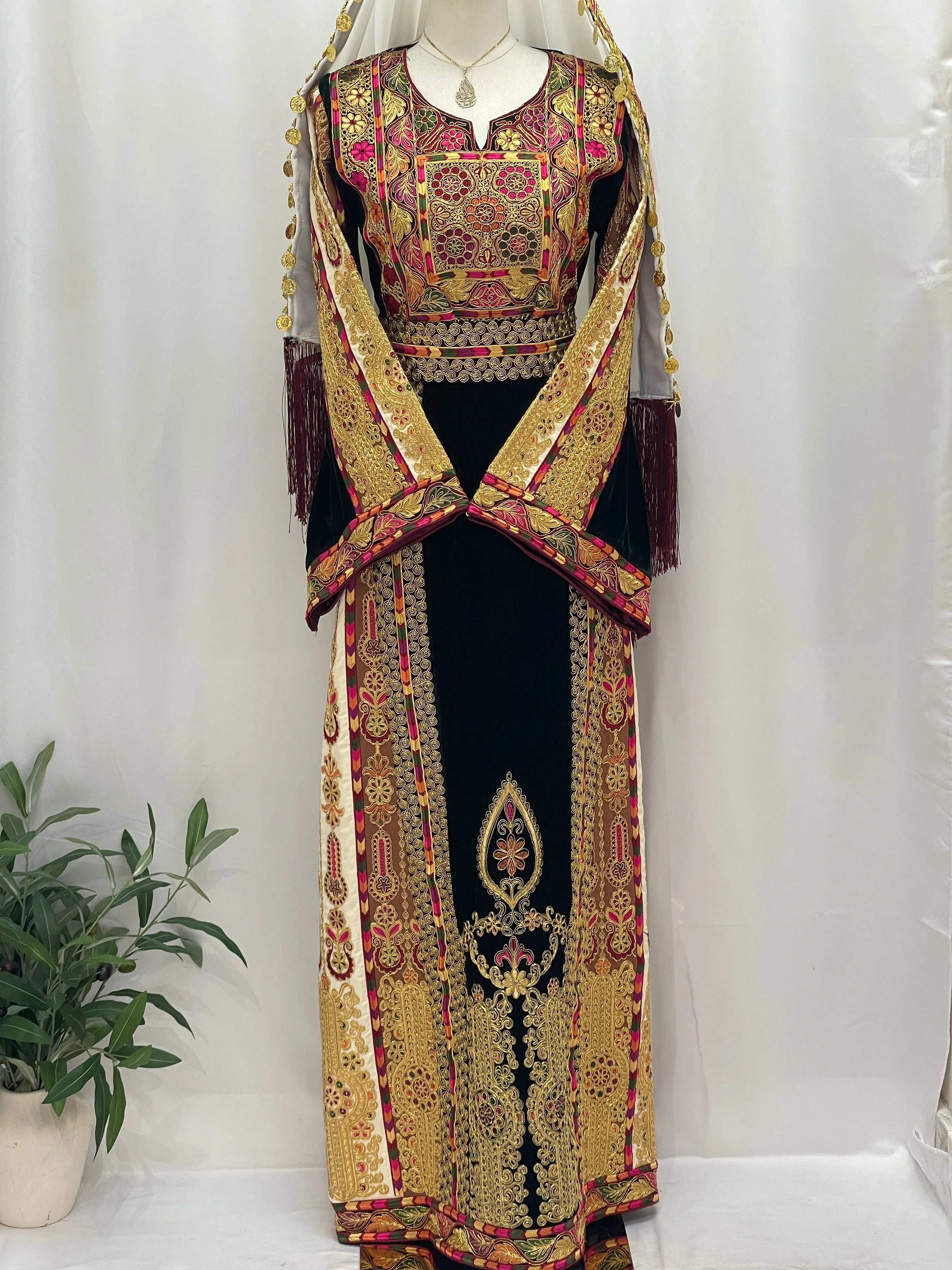 Malika Queen Emerald Thobe with intricate embroidery and elegant design, perfect for special occasions