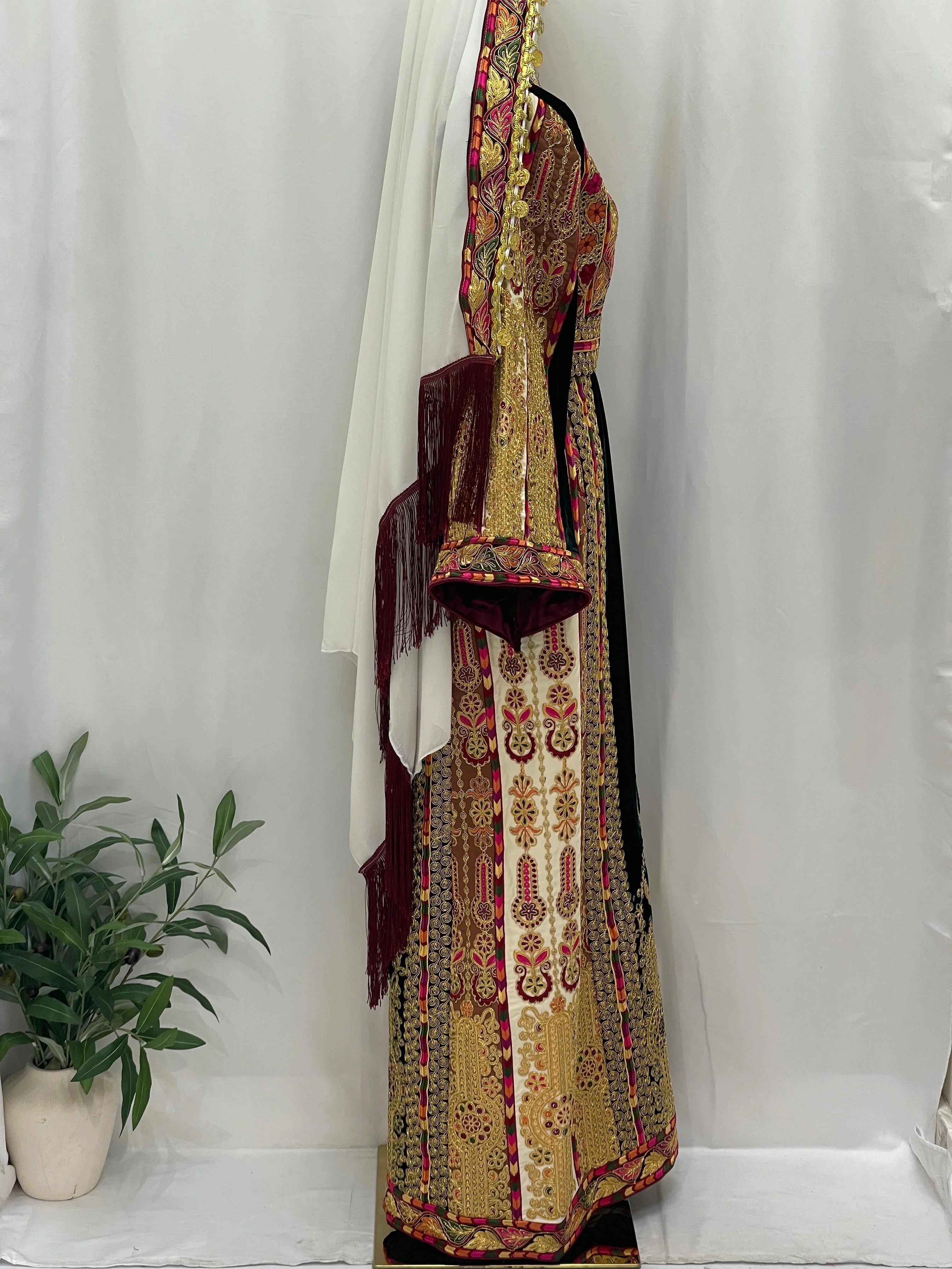 Malika Queen Emerald Thobe with vibrant embroidery and elegant details, ideal for special occasions