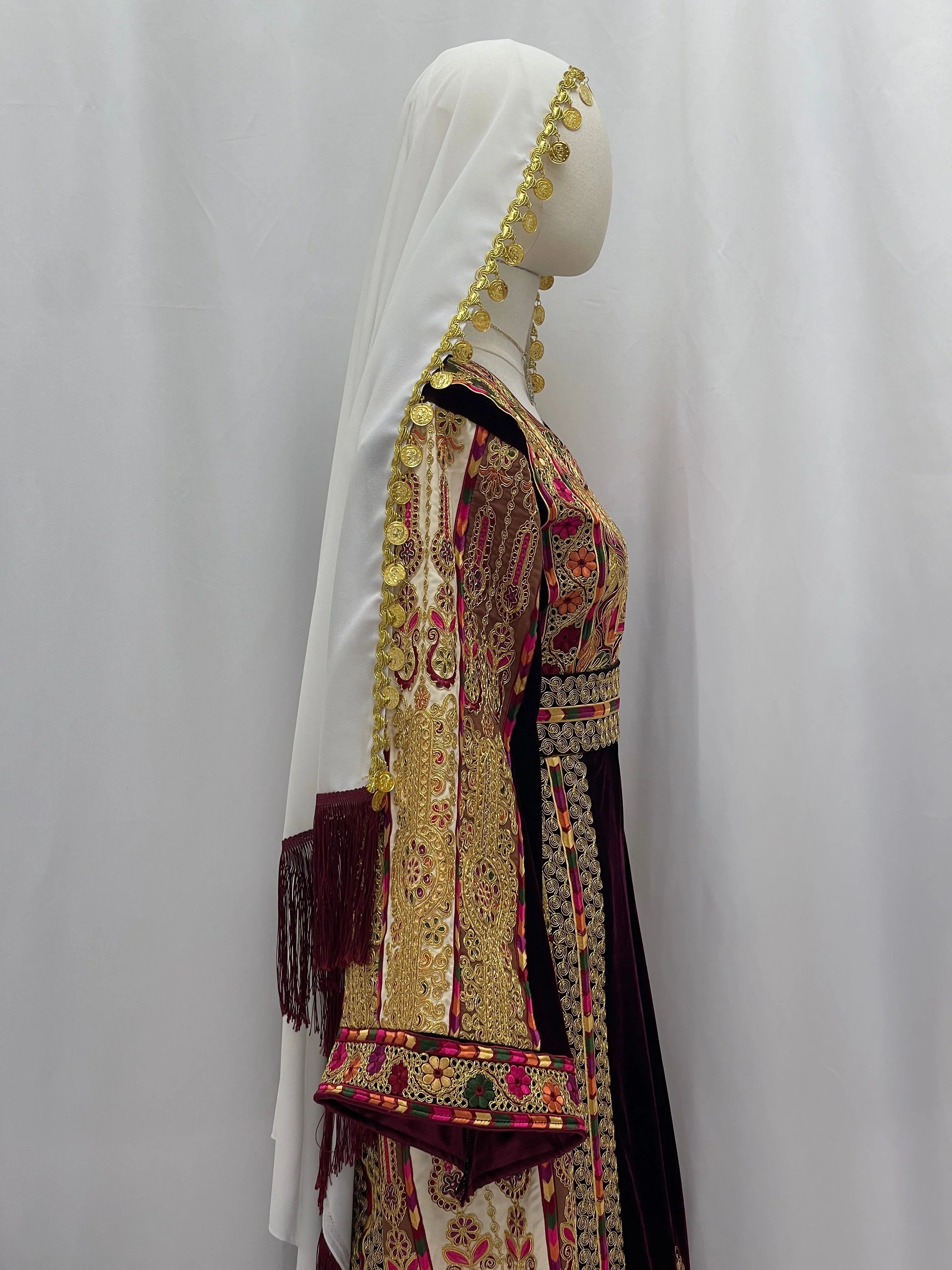 Malikat al-Turath Thoub with intricate embroidery and matching hijab, showcasing Palestinian elegance
