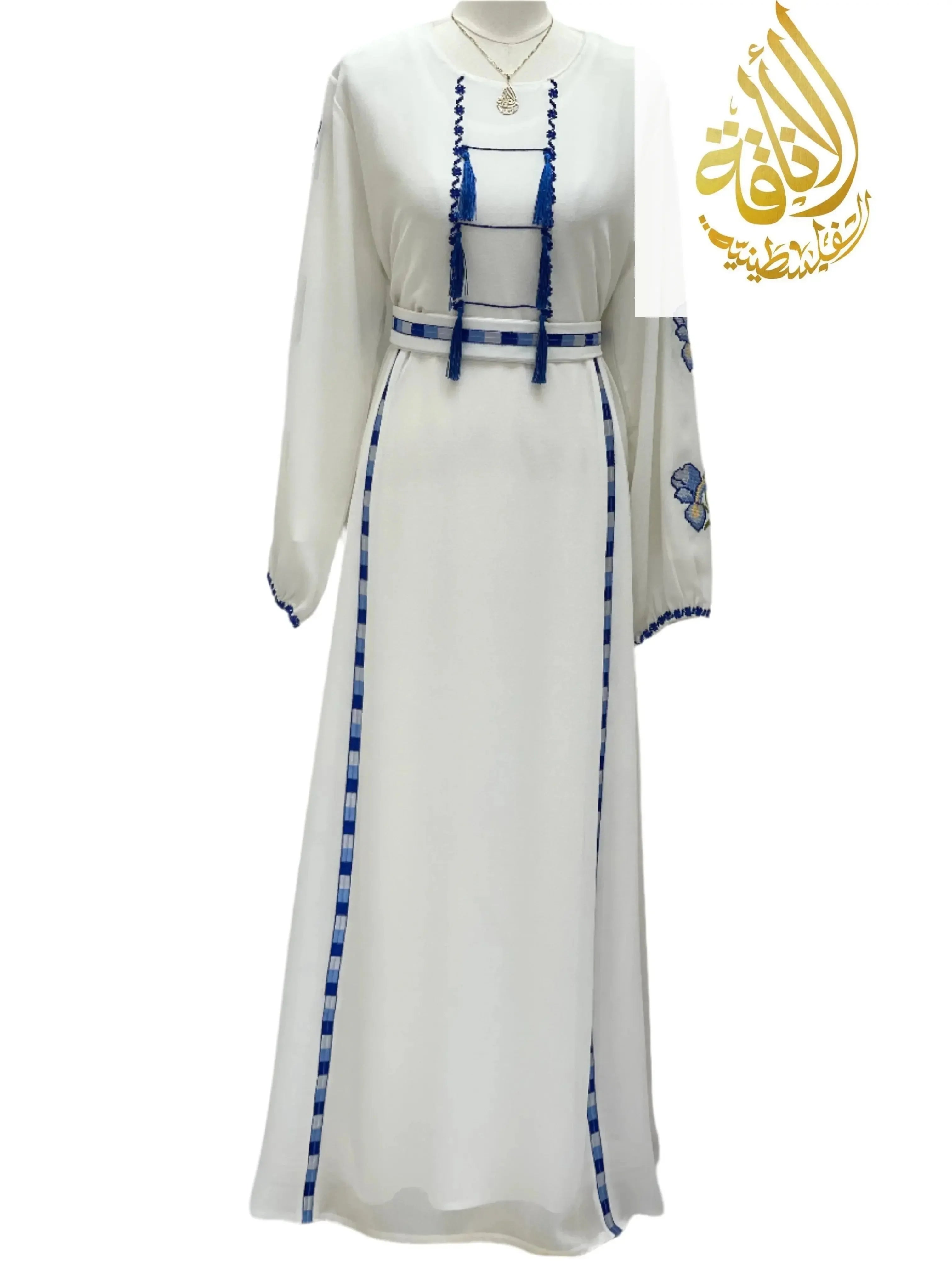 Palestinian embroidered dress by Palestinian Elegance in white with blue embroidery and long sleeves
