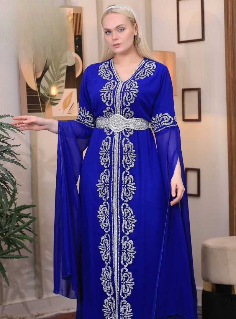 Palestinian Elegance embroidered kaftan dress in royal blue with intricate silver embroidery and flowing sleeves