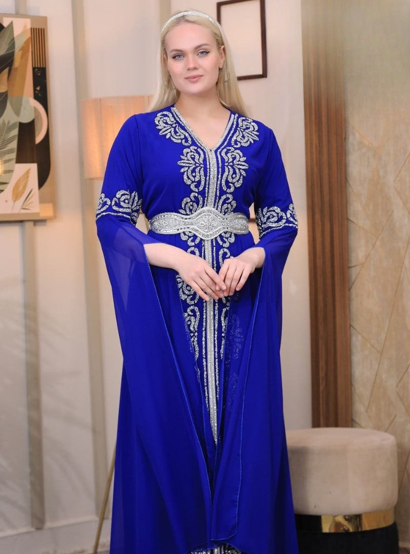 Palestinian Elegance blue embroidered kaftan dress with silver detailing and long flowing sleeves
