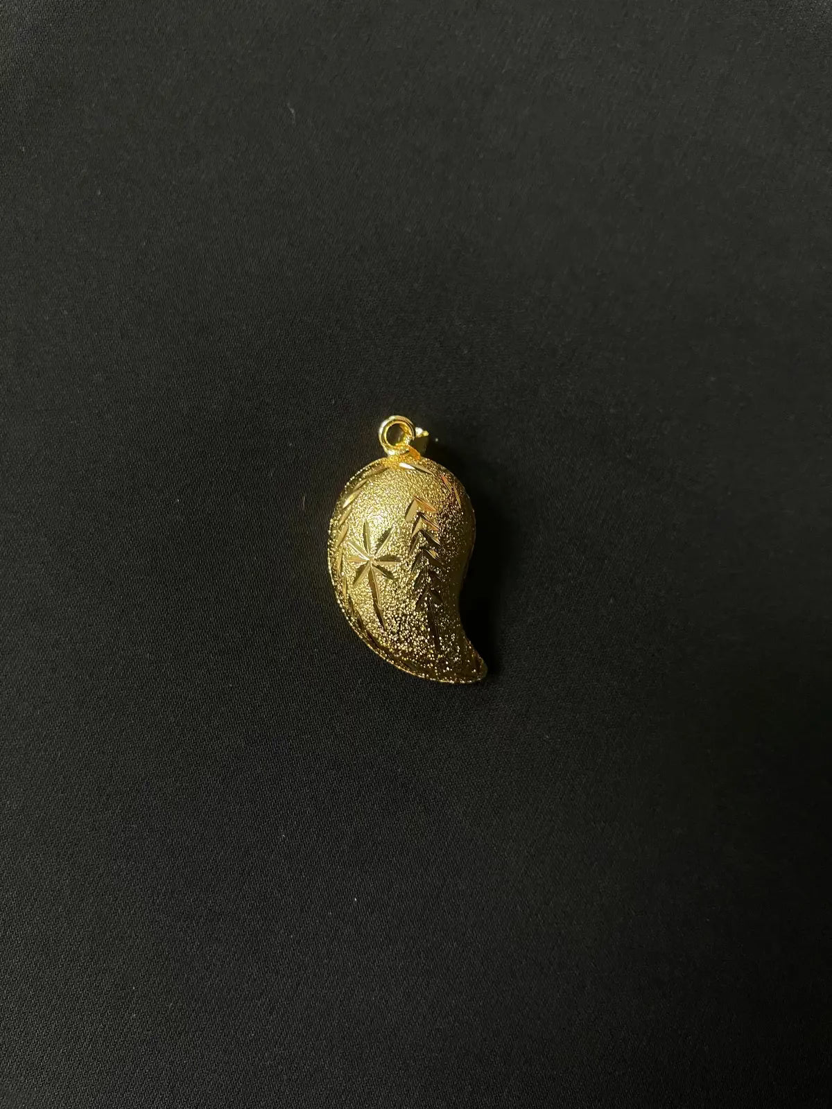 Palestinian Elegance Medium Almond Pendant in imitated gold with intricate floral design