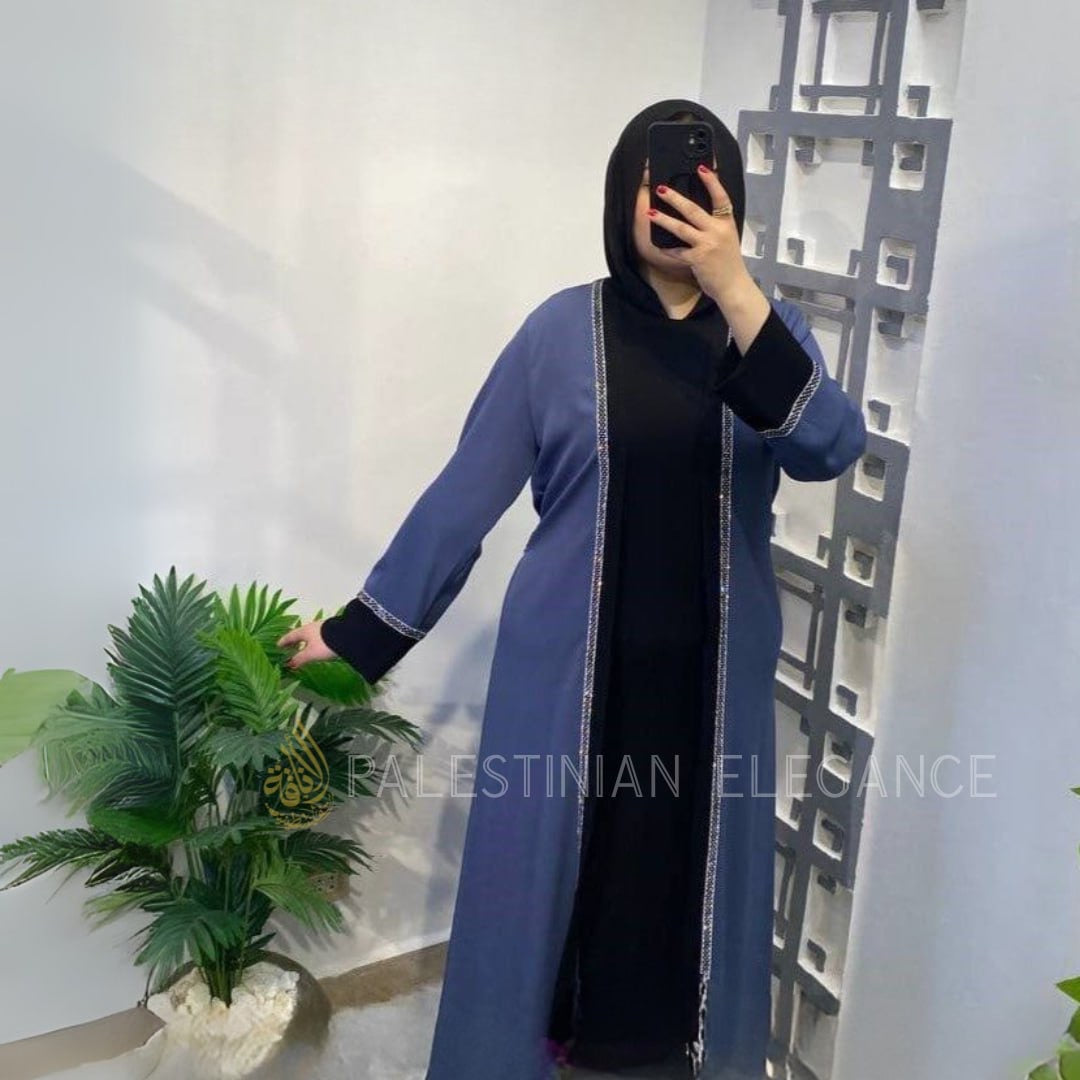 Palestinian Elegance modern 2-piece abaya with a black inner dress and blue outer robe with decorative trim