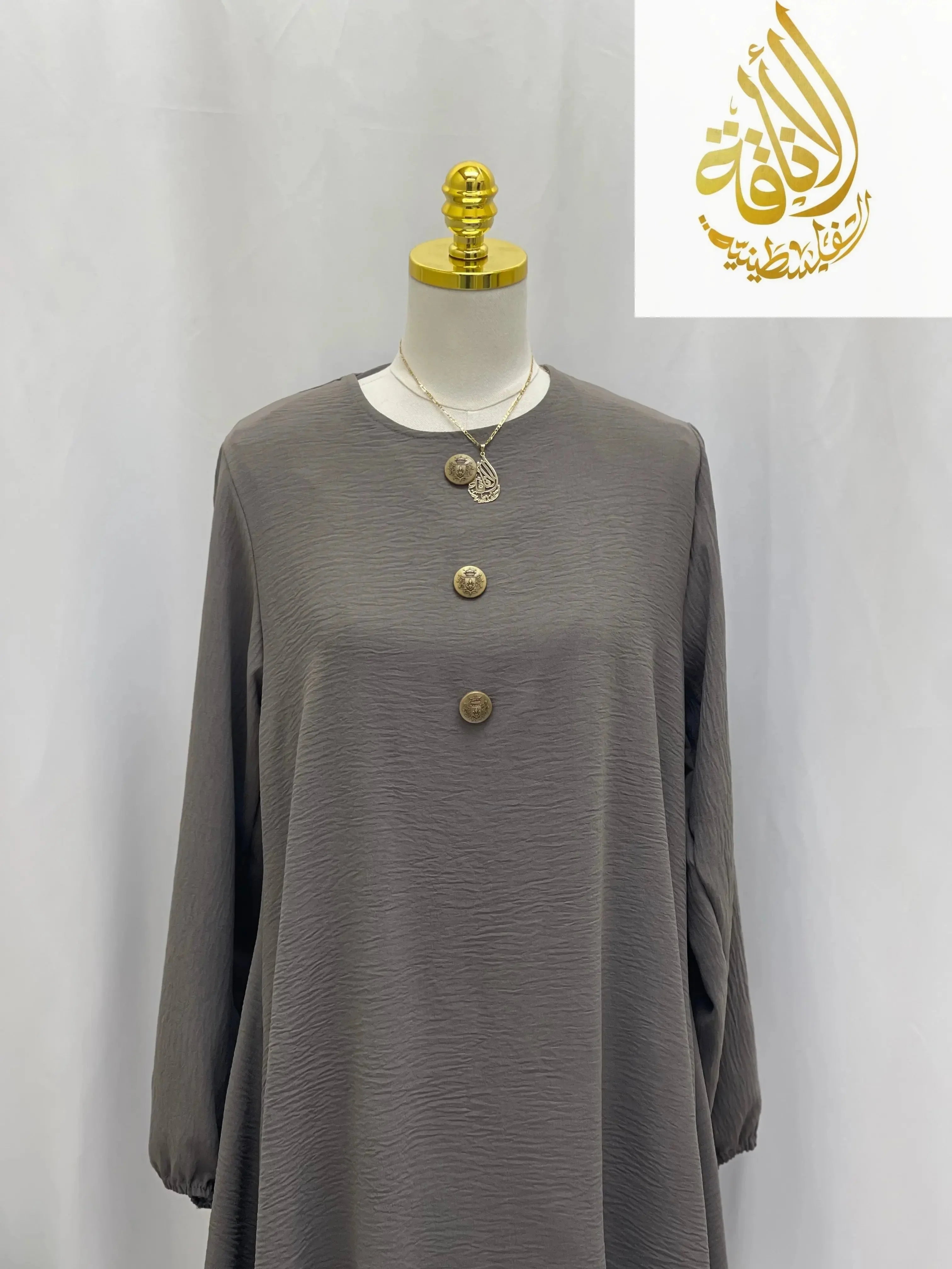 Palestinian Elegance modest long tunic and pant set in muted brown with decorative buttons on front