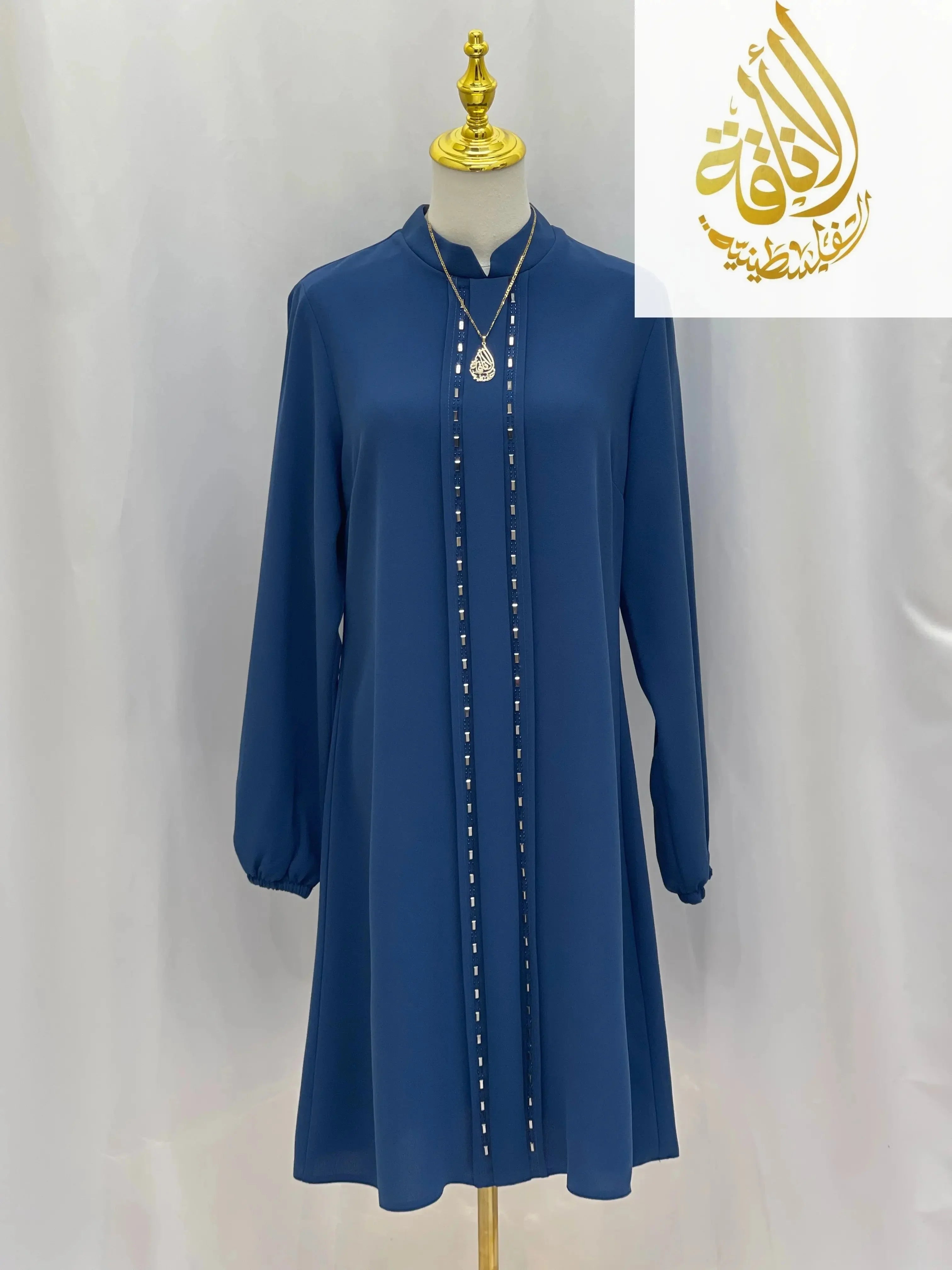 Palestinian Elegance modest embroidered tunic dress in blue with long sleeves and decorative vertical embroidery
