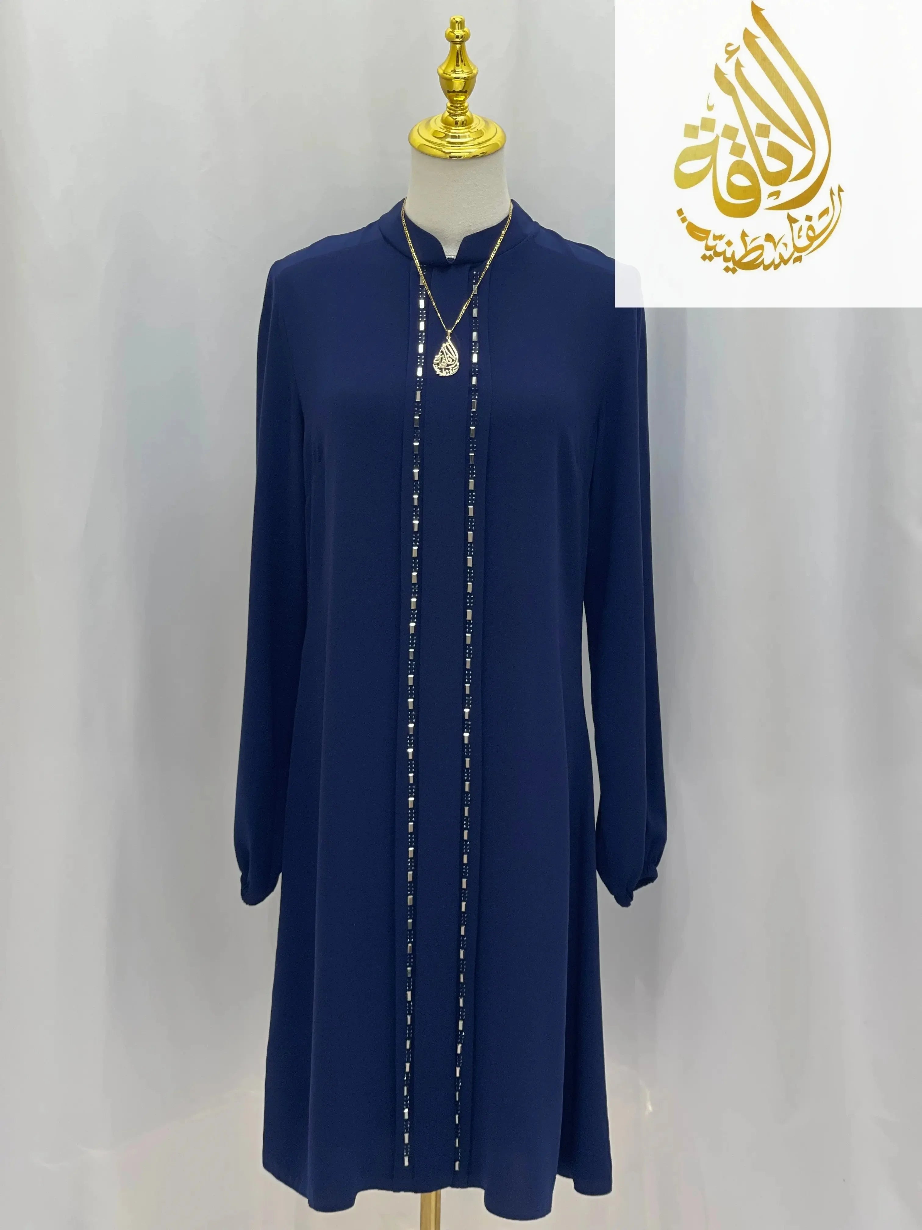 Palestinian Elegance modest embroidered tunic dress in navy blue with long sleeves and delicate front embroidery