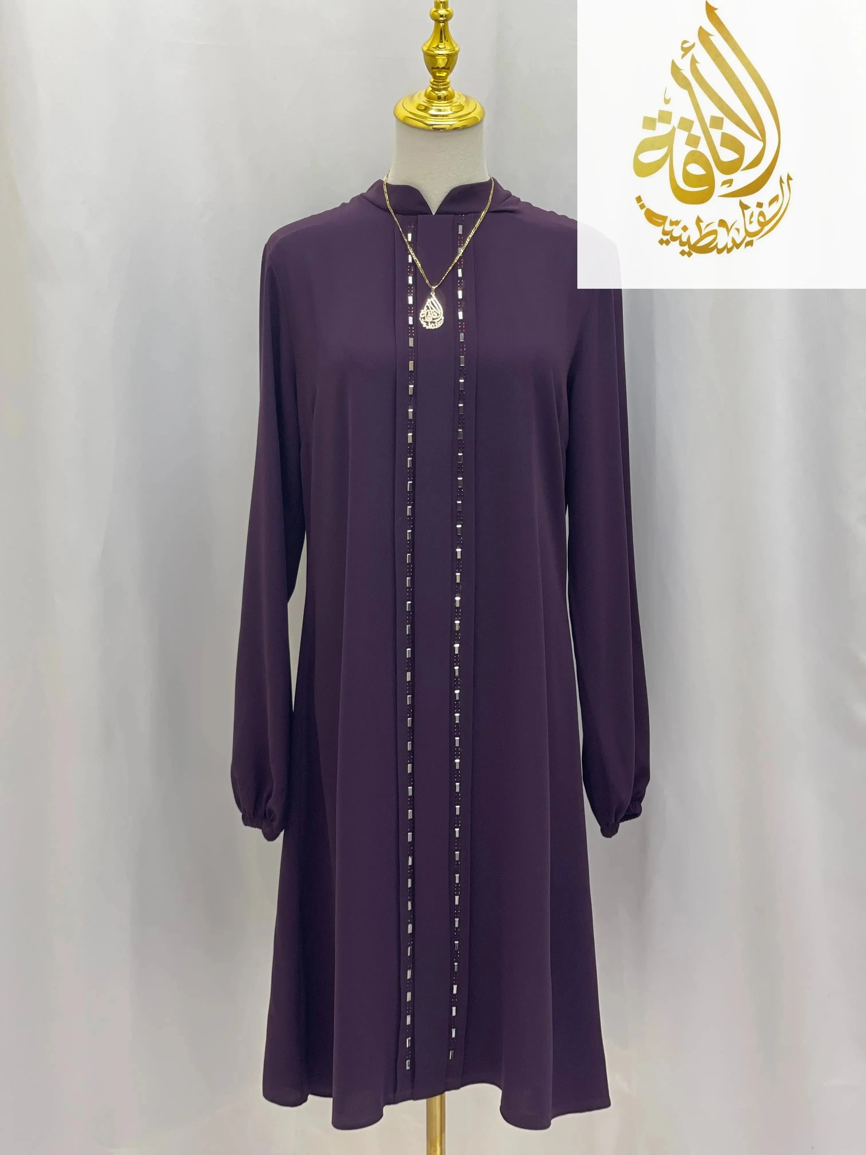 Purple modest embroidered tunic dress by Palestinian Elegance with long sleeves and decorative front embroidery