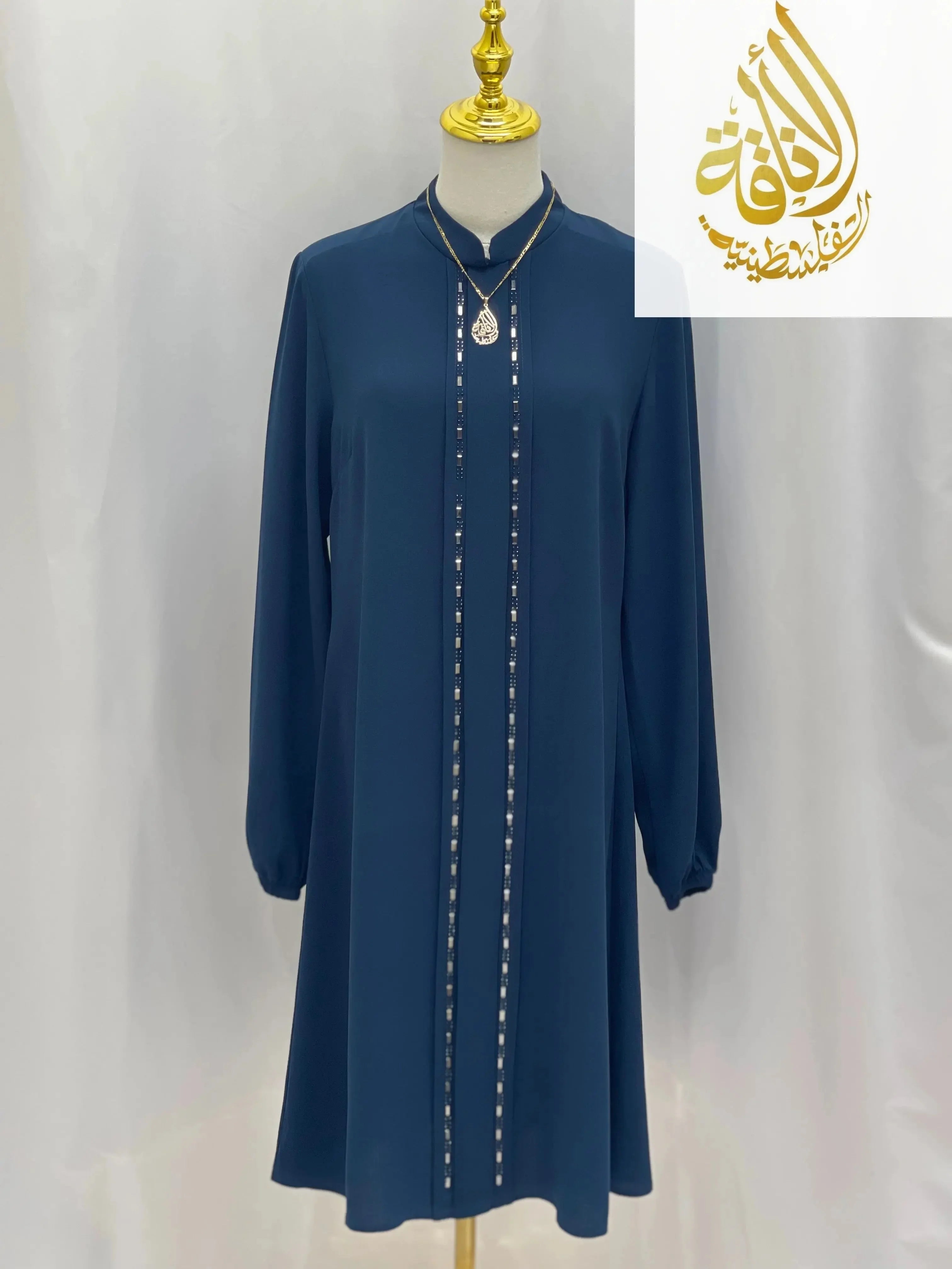 Palestinian Elegance modest embroidered tunic dress in navy blue with long sleeves and vertical bead detailing