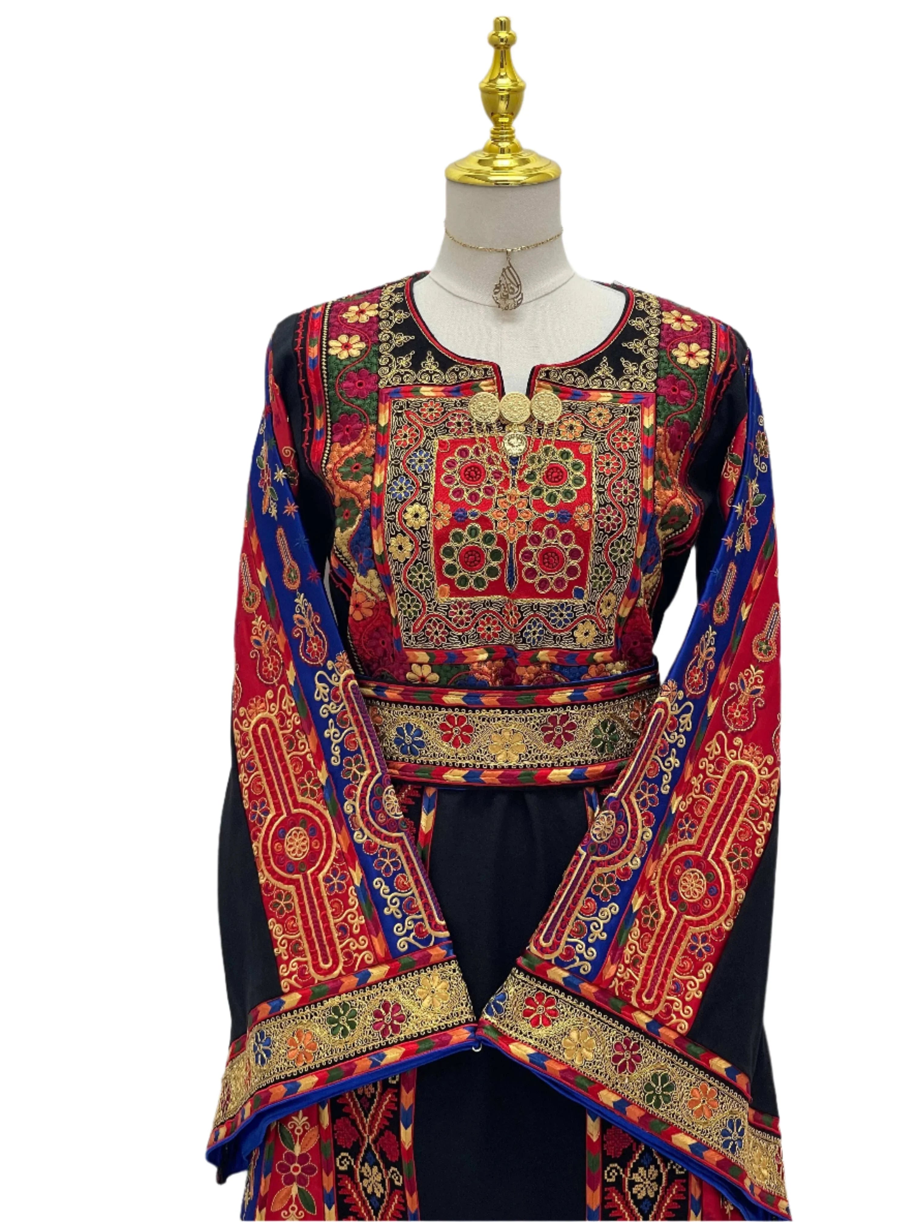 Mona Soft Atmeen Thoub Kasab Embroidery by Palestinian Elegance with vibrant traditional red and blue embroidery on black fabric