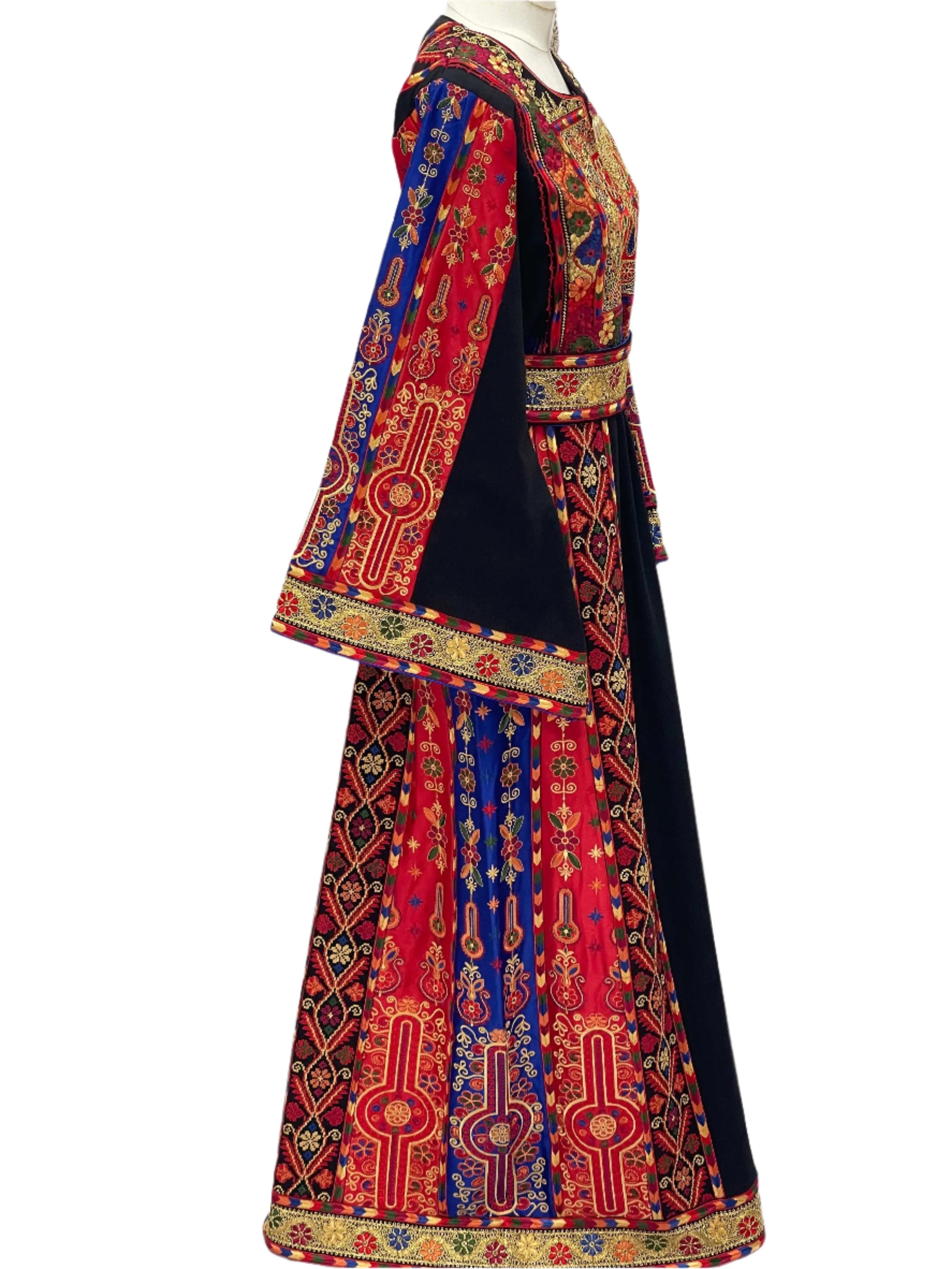 Palestinian Elegance embroidered Mona Soft Atmeen Thoub Kasab Embroidery dress with vibrant red and blue patterns