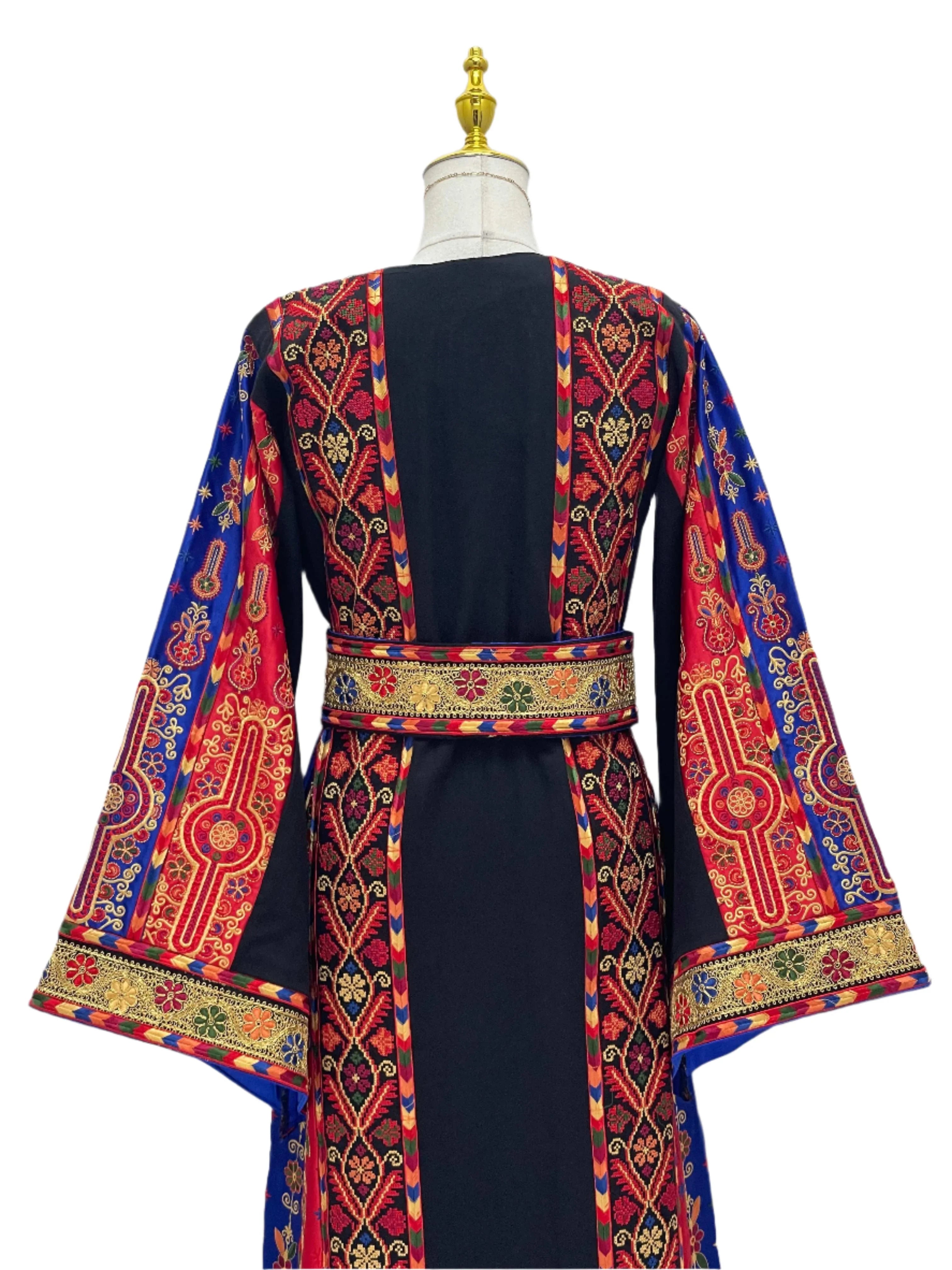 Mona Soft Atmeen Thoub Kasab Embroidery embroidered dress with colorful traditional patterns and wide sleeves