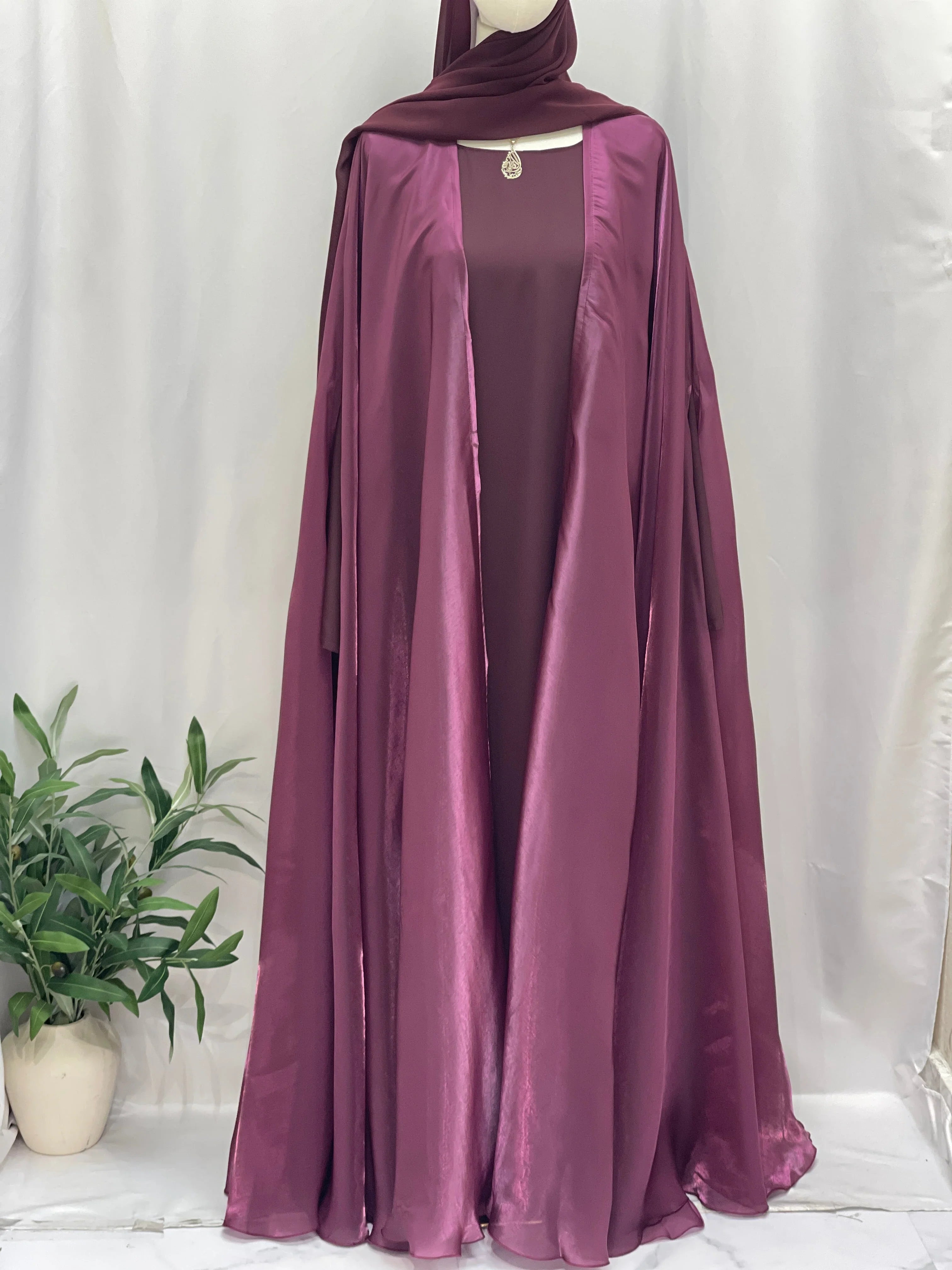 Palestinian Elegance Moonlit Organza Abaya in deep mauve with flowing satin finish and matching headscarf