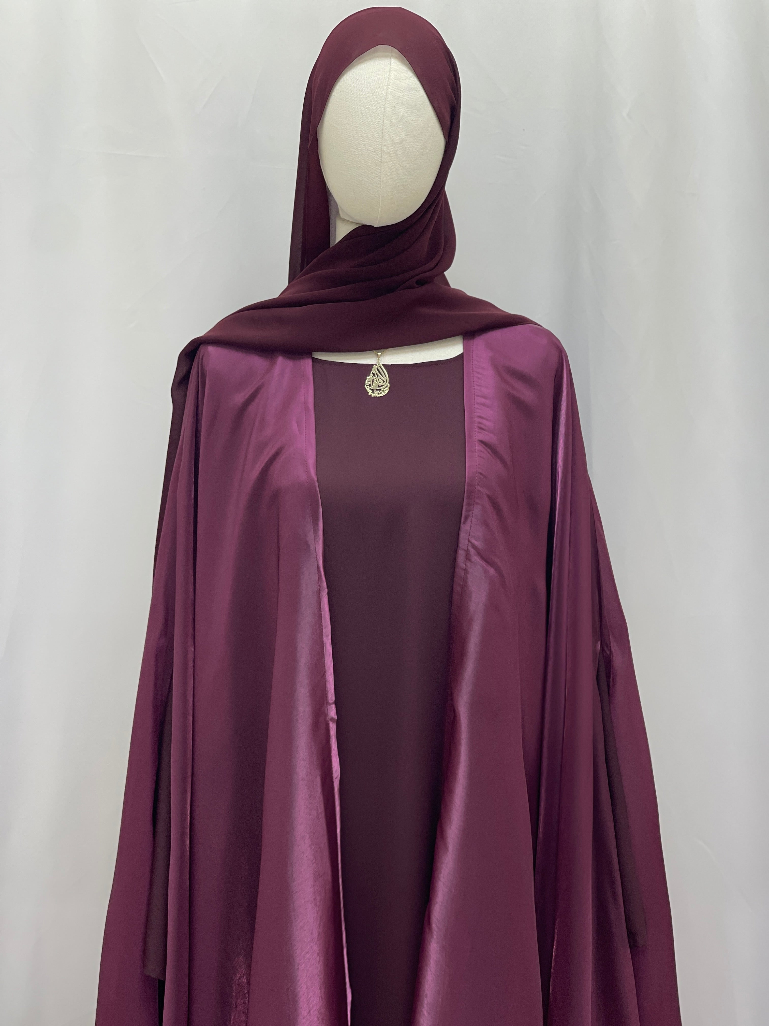 Moonlit Organza Abaya by Palestinian Elegance in deep purple with flowing fabric and matching hijab
