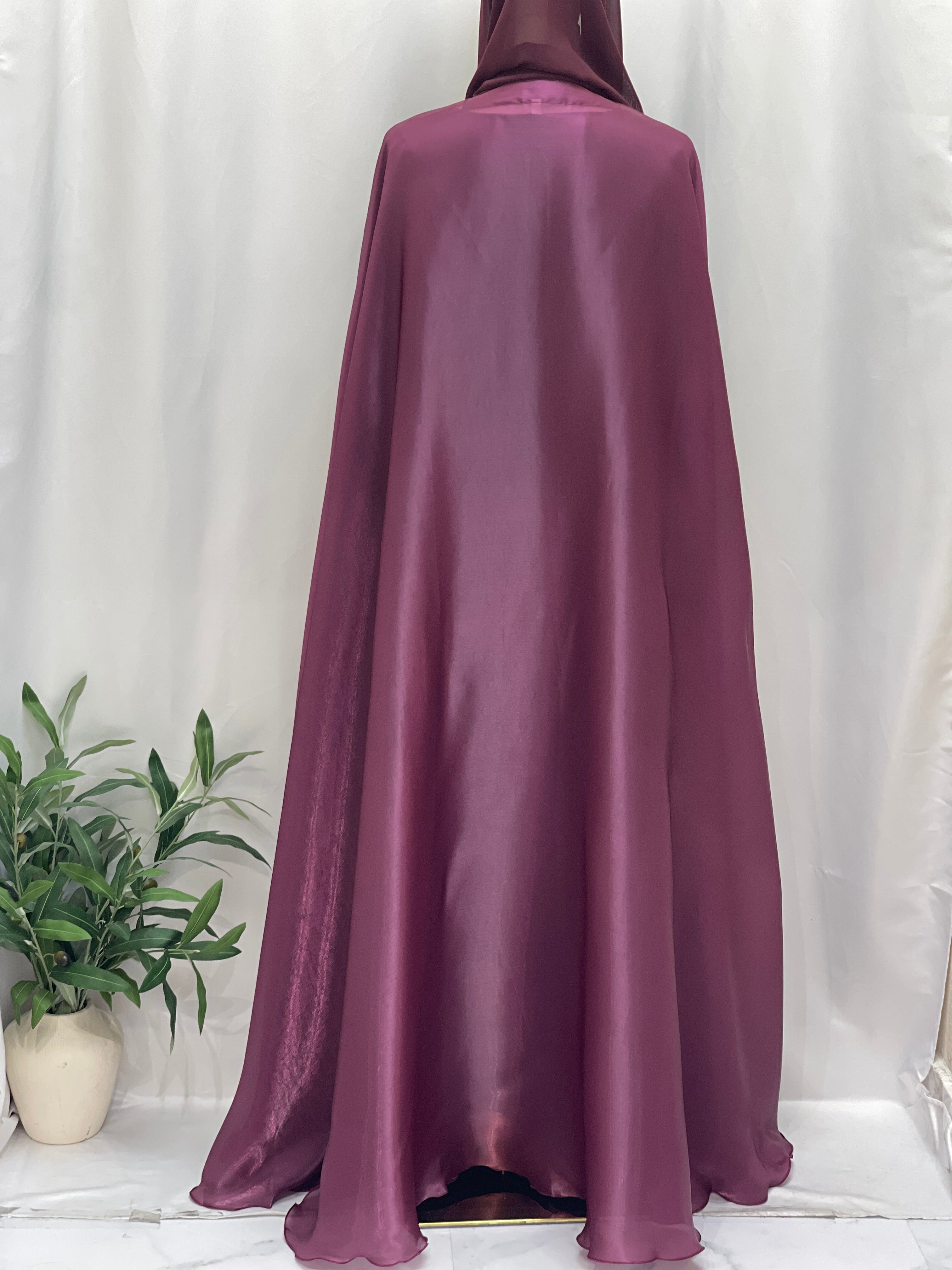 Back view of a purple Moonlit Organza Abaya by Palestinian Elegance with a flowing, elegant design