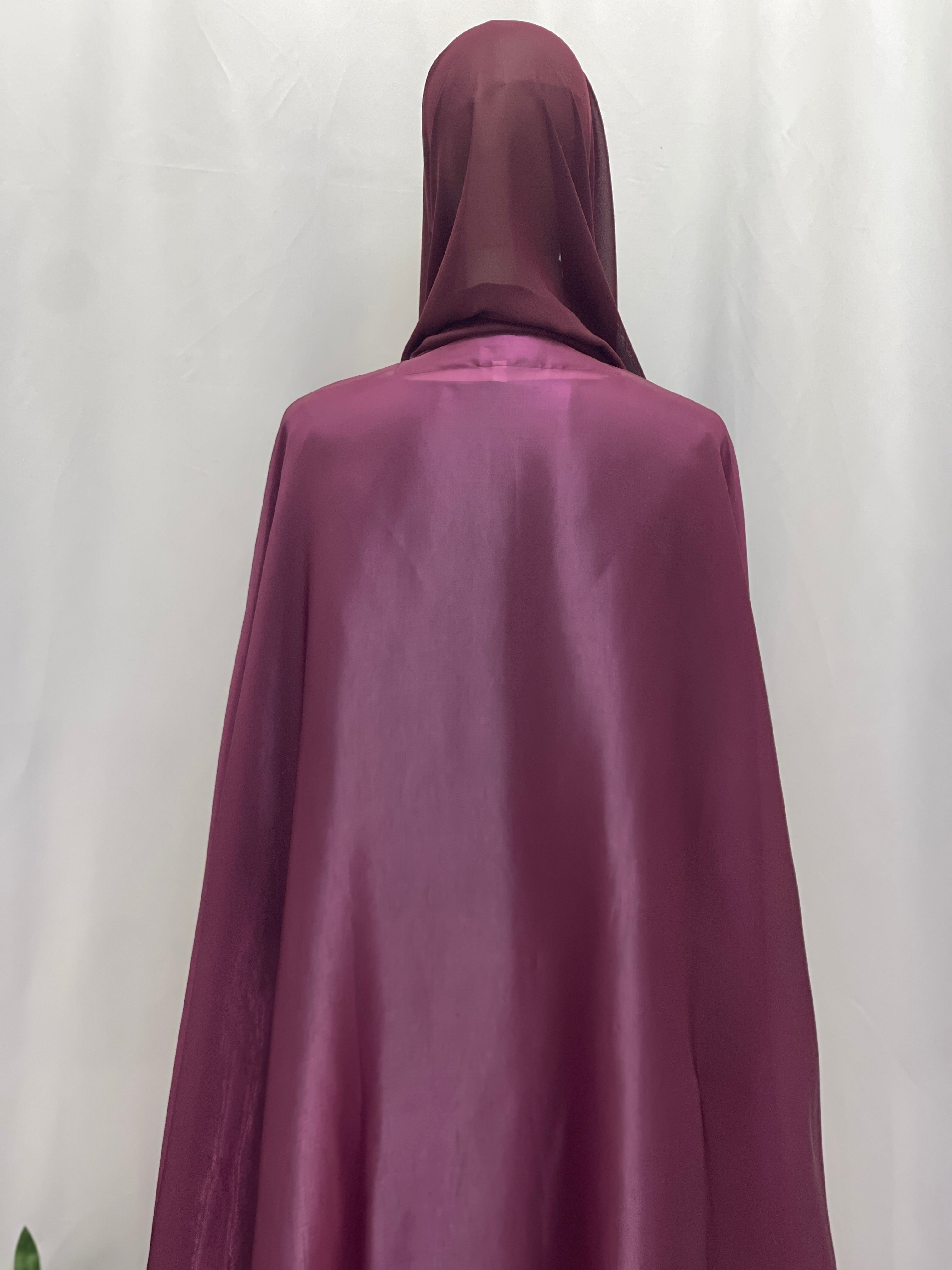 Back view of Moonlit Organza Abaya in deep purple from Palestinian Elegance with a smooth, flowing fabric