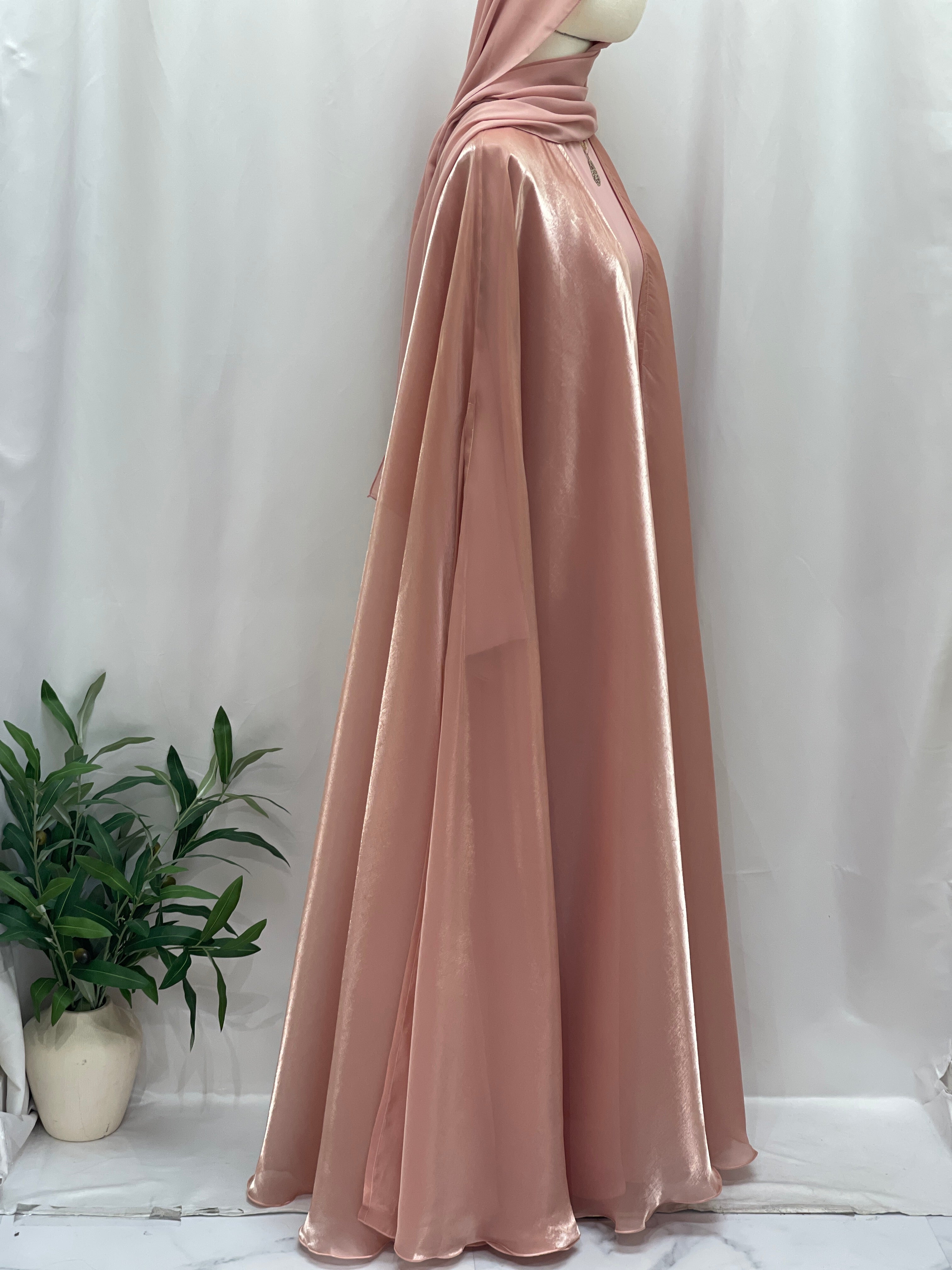 Moonlit Organza Abaya by Palestinian Elegance, featuring a soft pink flowing organza fabric with a modest full-length design