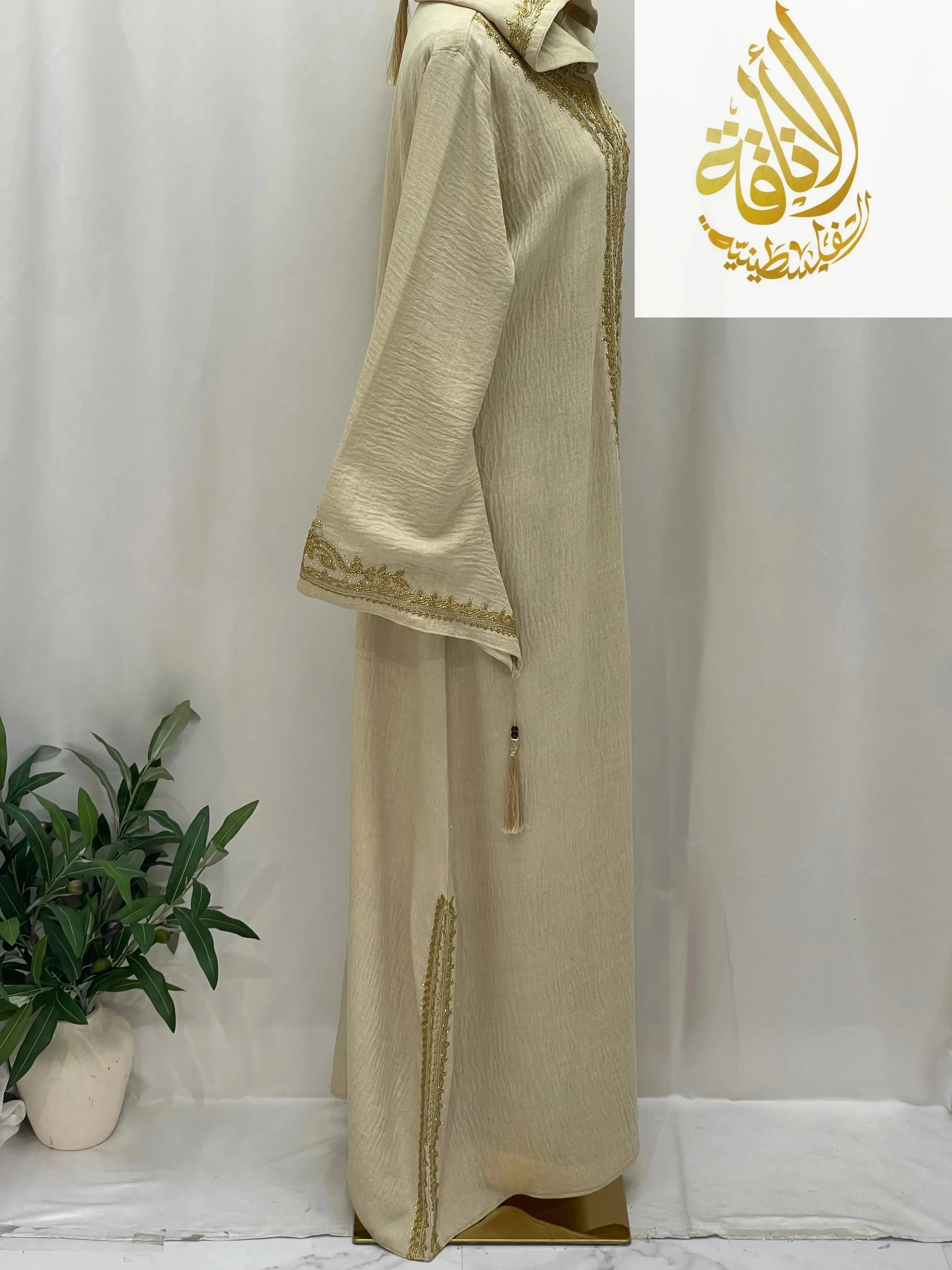 Palestinian Elegance Moroccan Embroidered Djellaba beige abaya with gold embroidery hood tassel and side slit