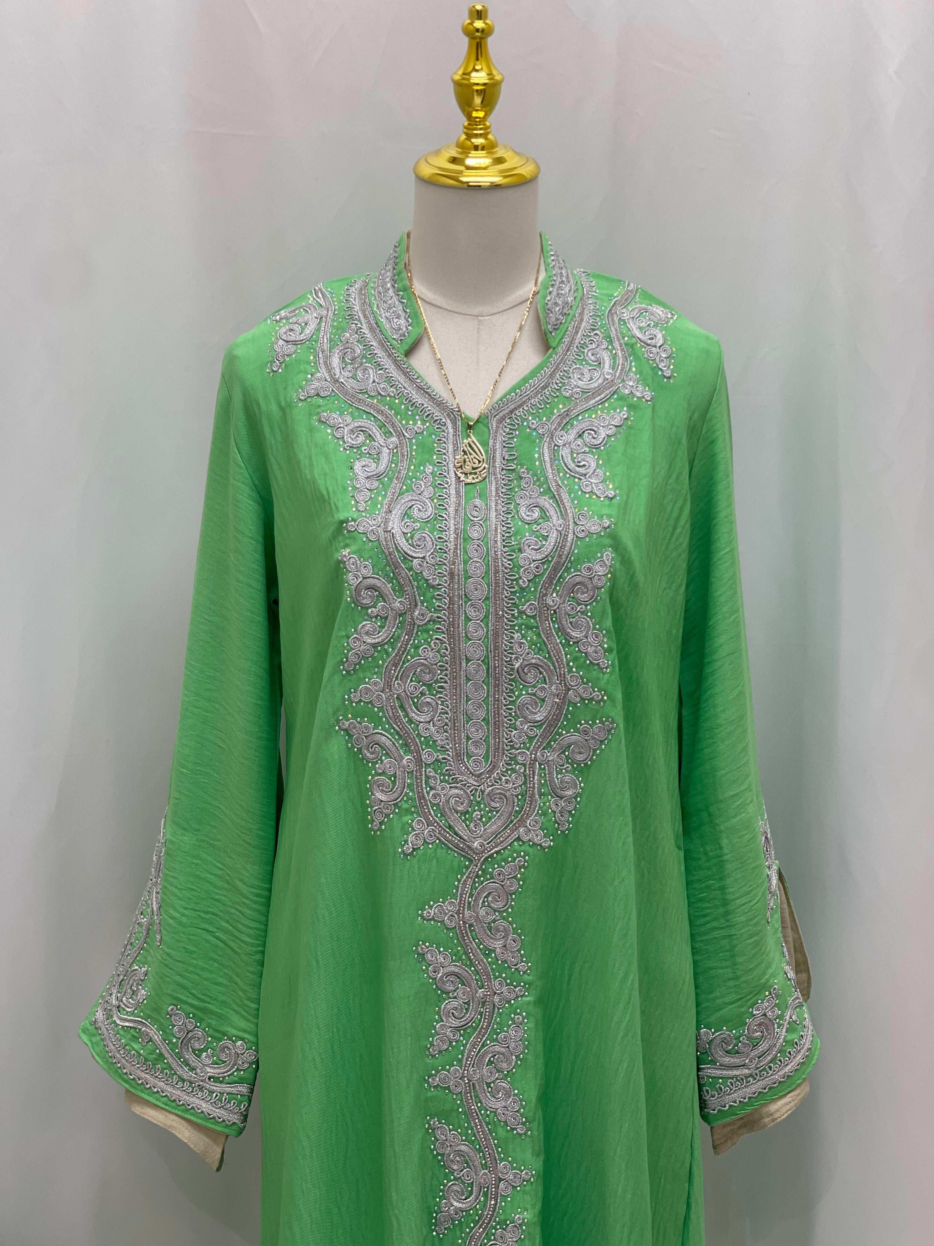 Palestinian Elegance green abaya with intricate silver embroidery Moroccan Rana Jalabia design on front and sleeves
