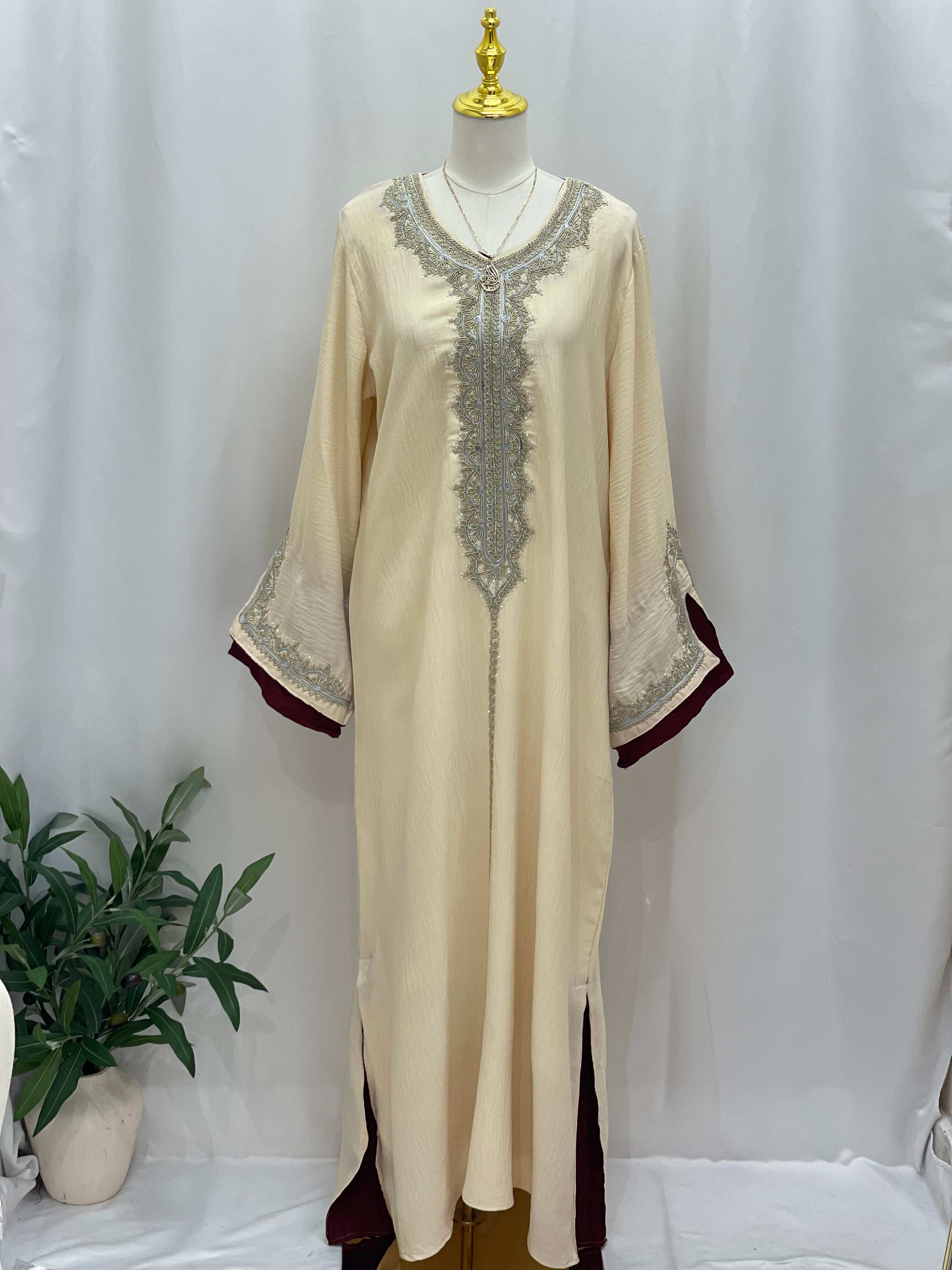Palestinian Elegance Moroccan Rana Jalabia cream abaya with silver embroidery and maroon accents