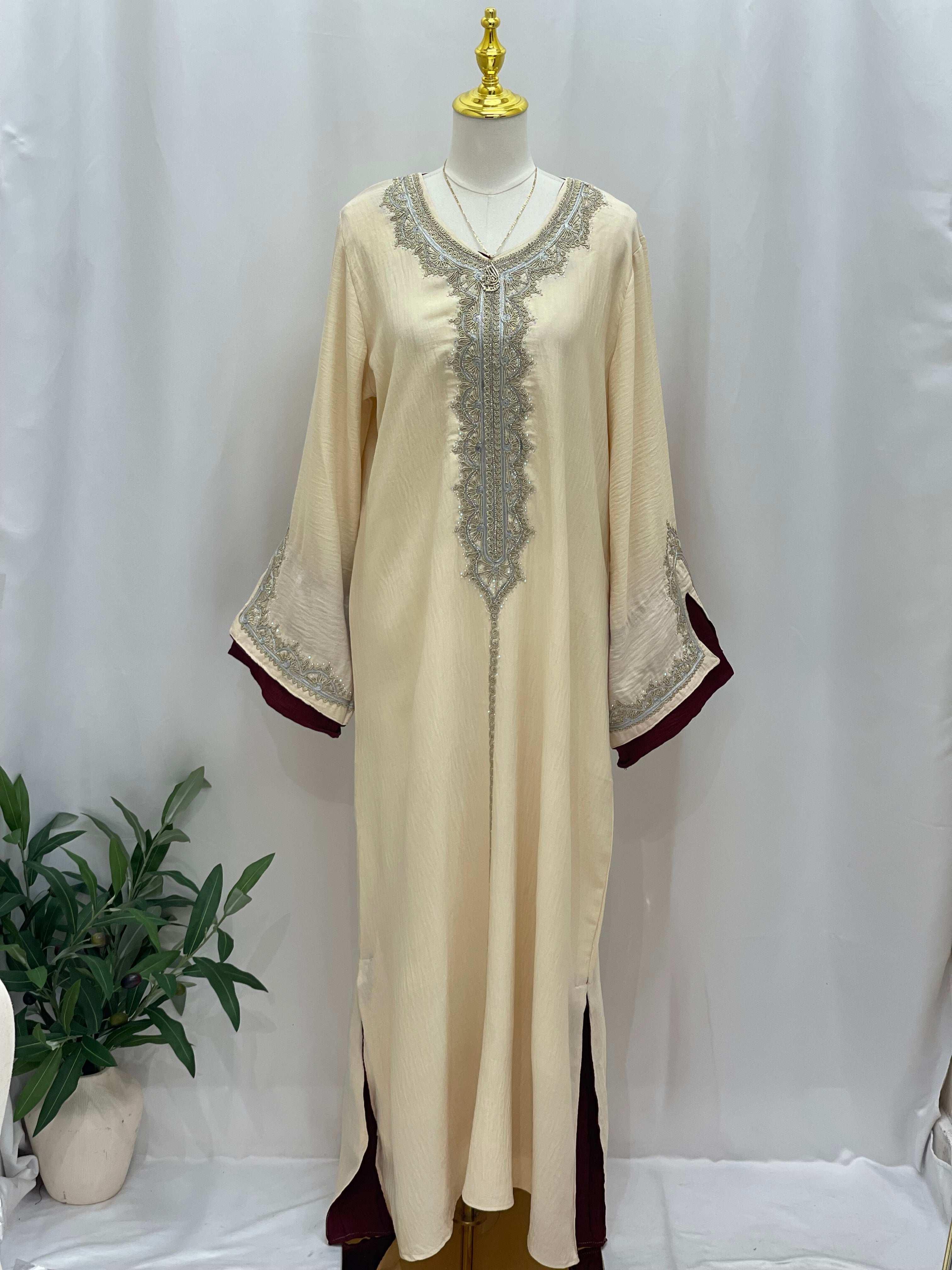 Palestinian Elegance Moroccan Rana Jalabia cream abaya with silver embroidery and maroon accents