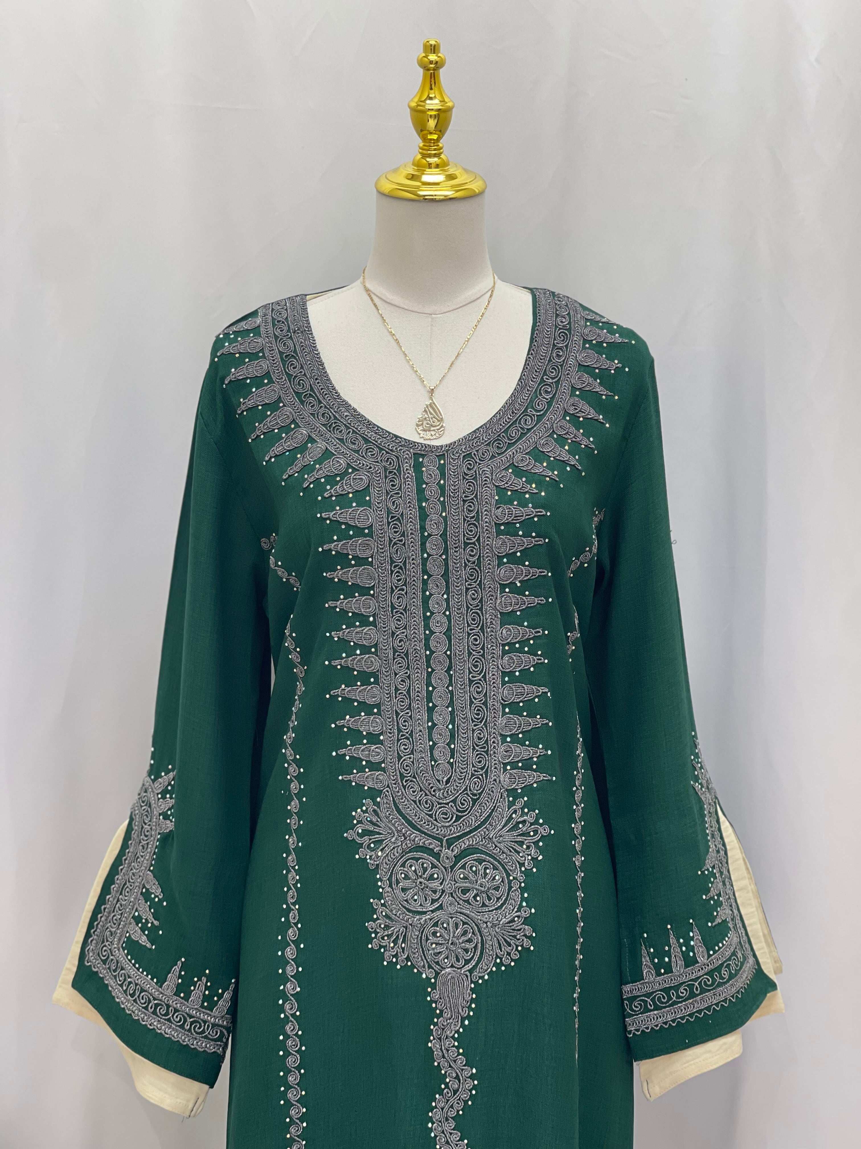 Palestinian Elegance green Moroccan Salma Jalabia abaya with silver embroidery on neckline and sleeves