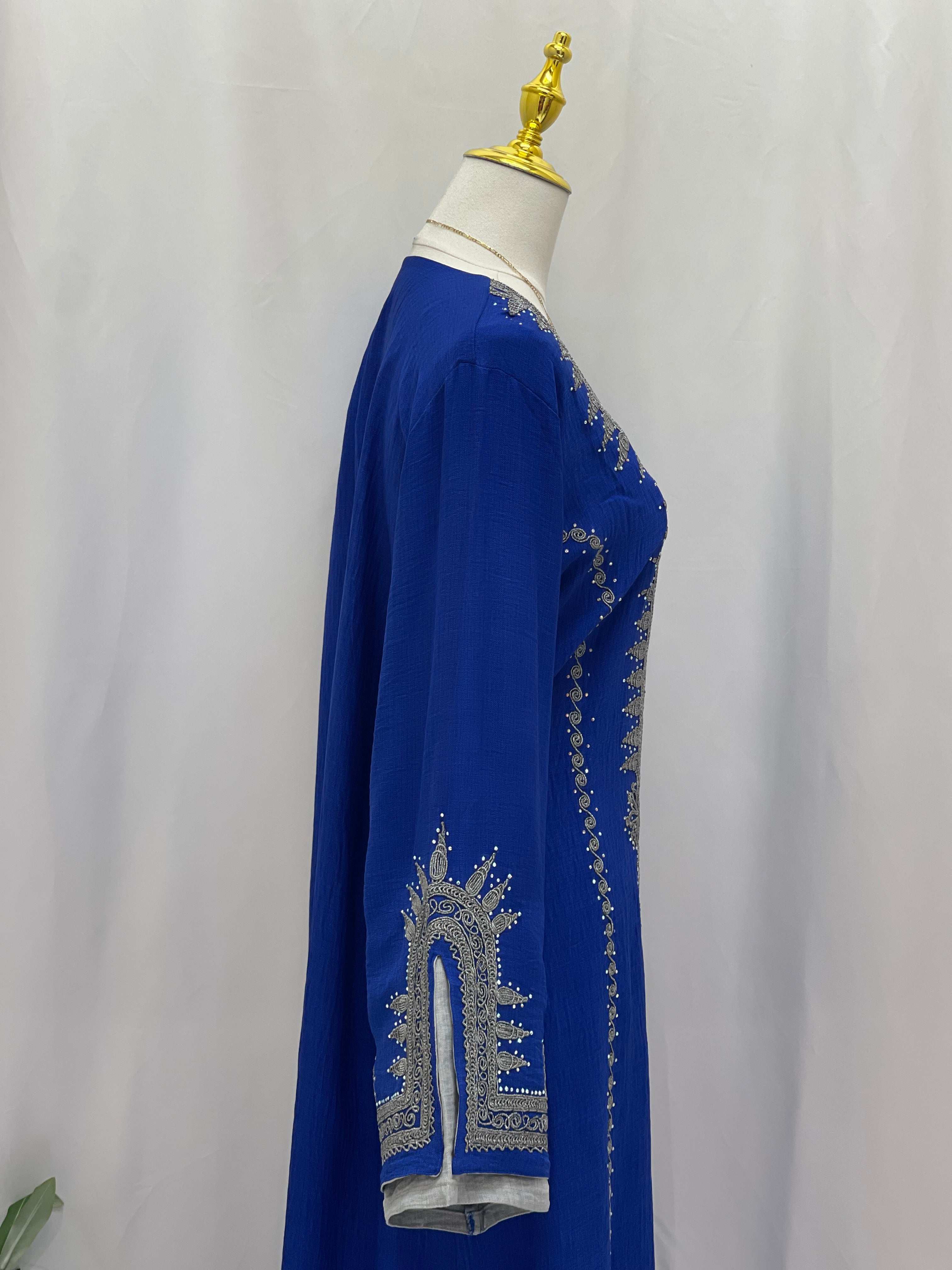 Blue Palestinian Elegance abaya featuring intricate silver embroidery on sleeve, Moroccan Salma Jalabia style