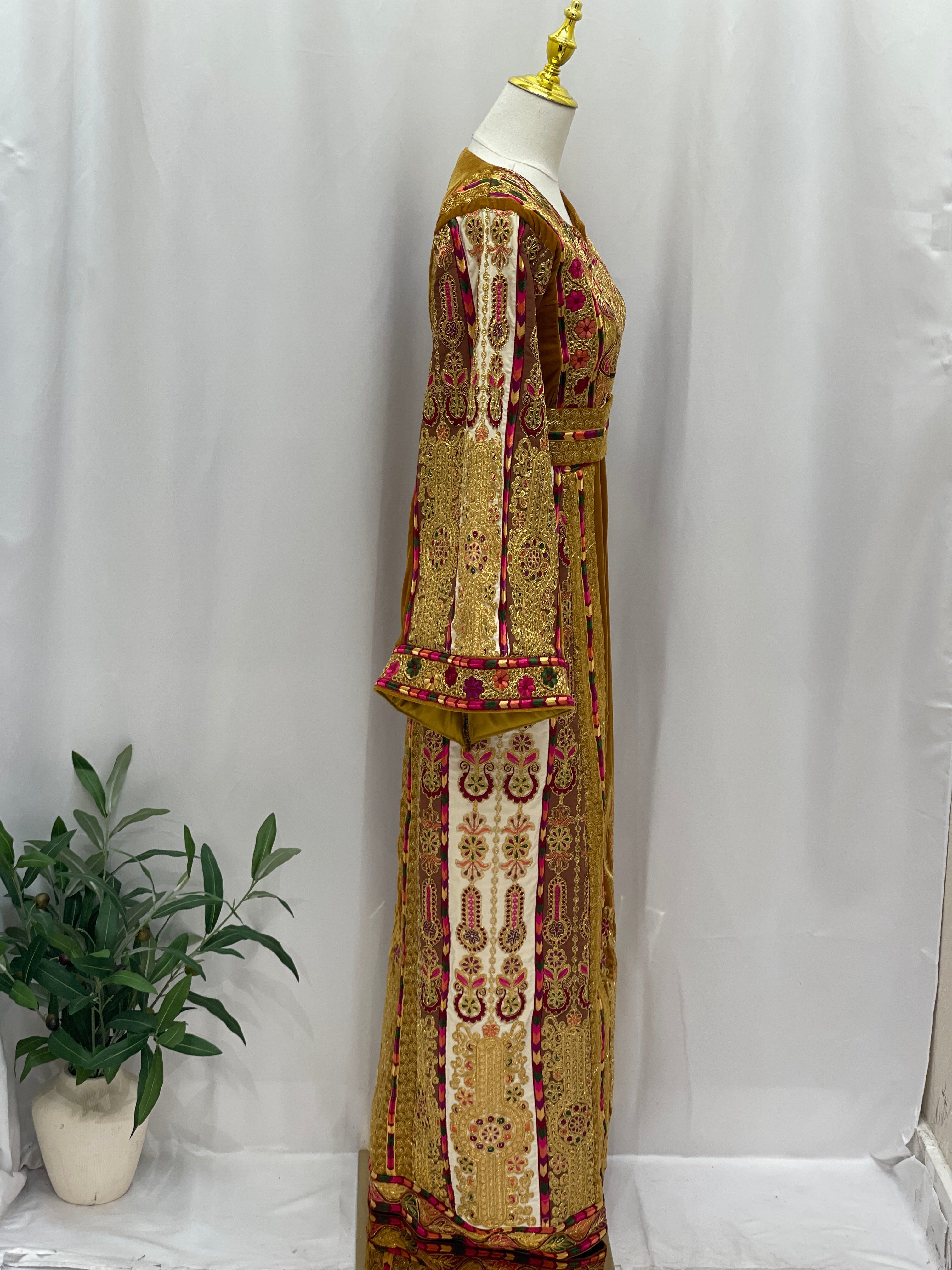 Traditional Malaka Embroidered Thoub by Palestinian Elegance in gold and red detailed embroidery on full length thobe
