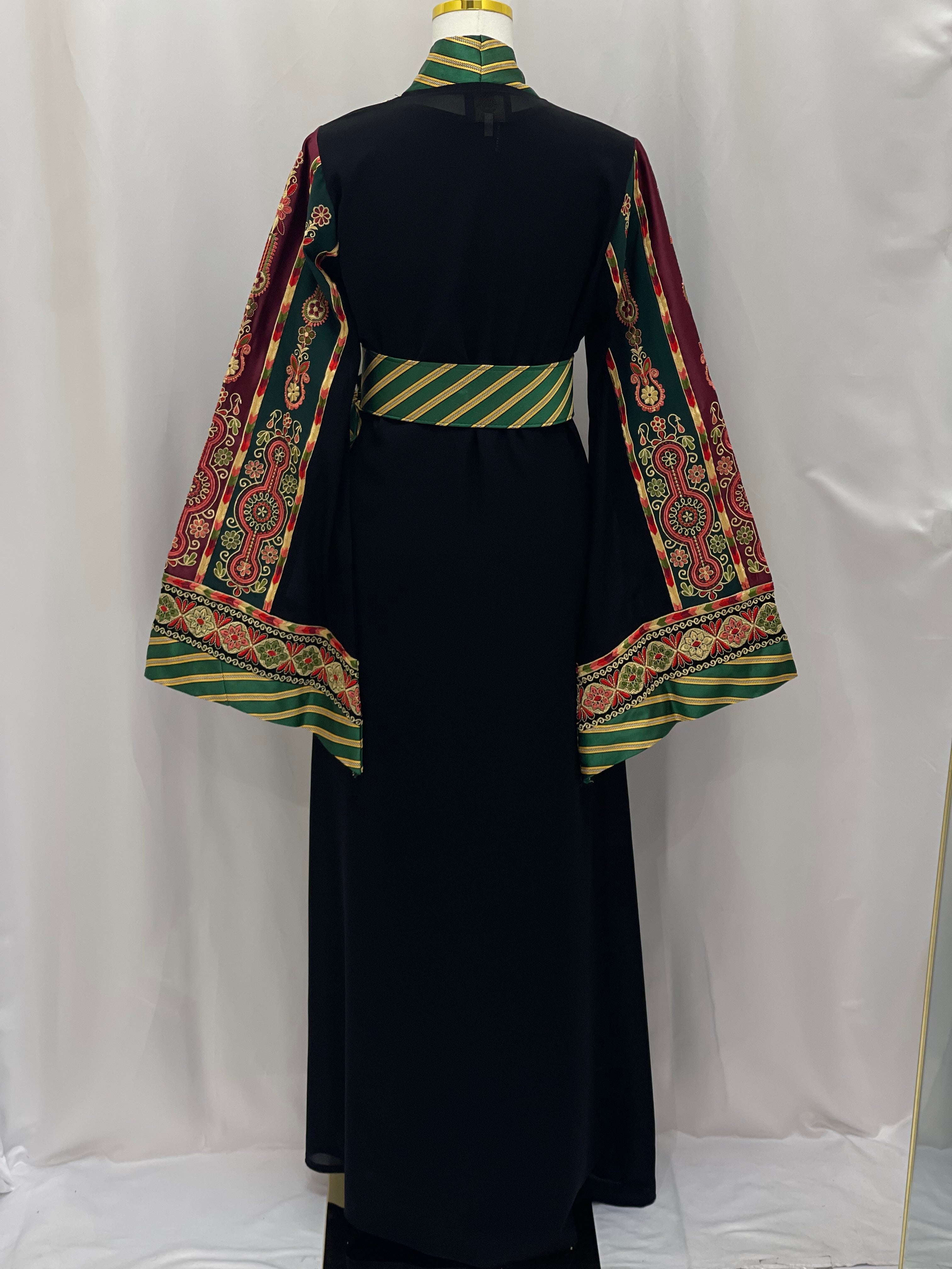 Back view of Narmeen embroidered Kashmir open abaya with intricate multicolor embroidery on sleeves and green striped belt