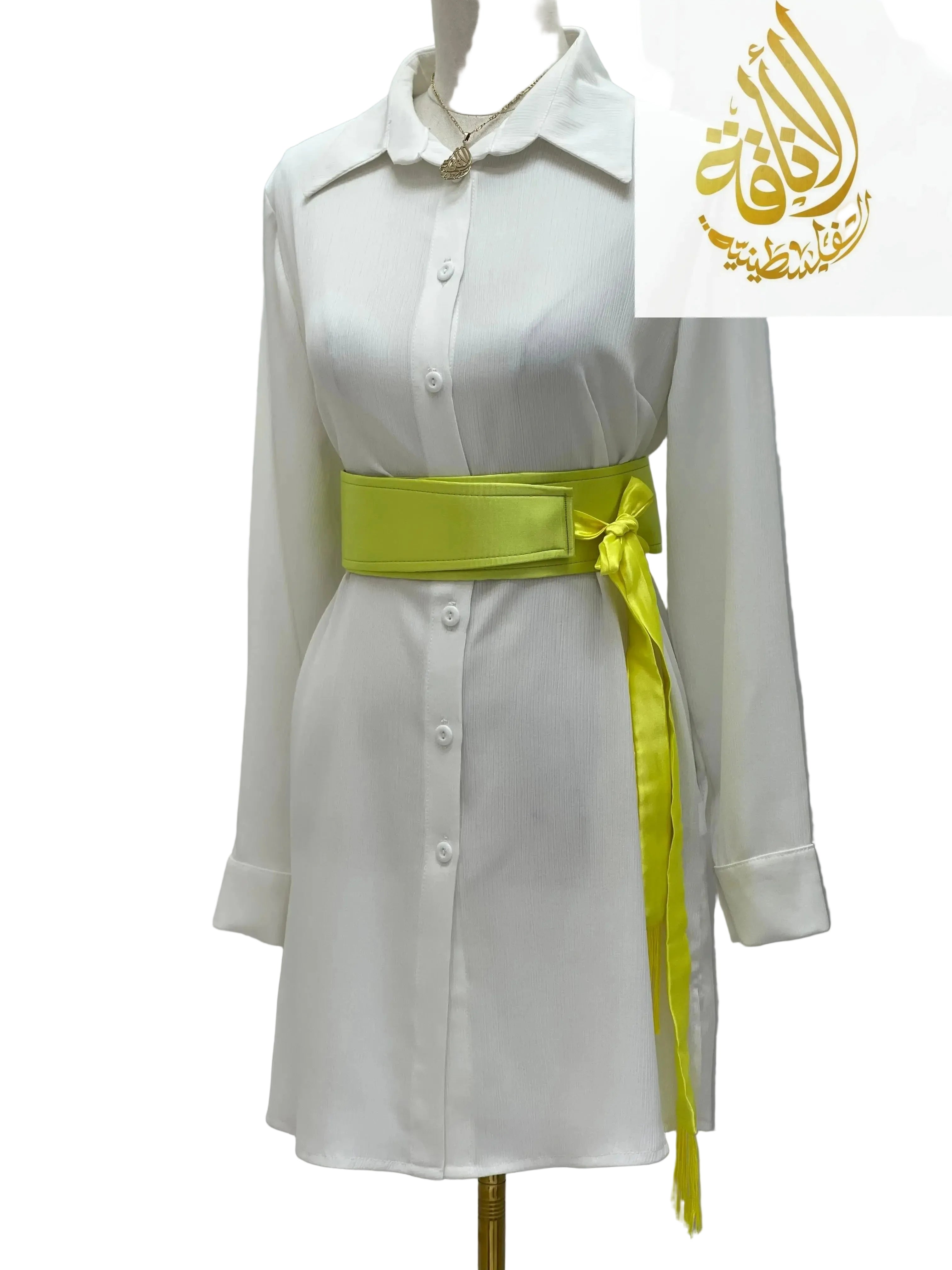 Yellow satin belt for dresses styled on a white button-down shirt dress by Palestinian Elegance