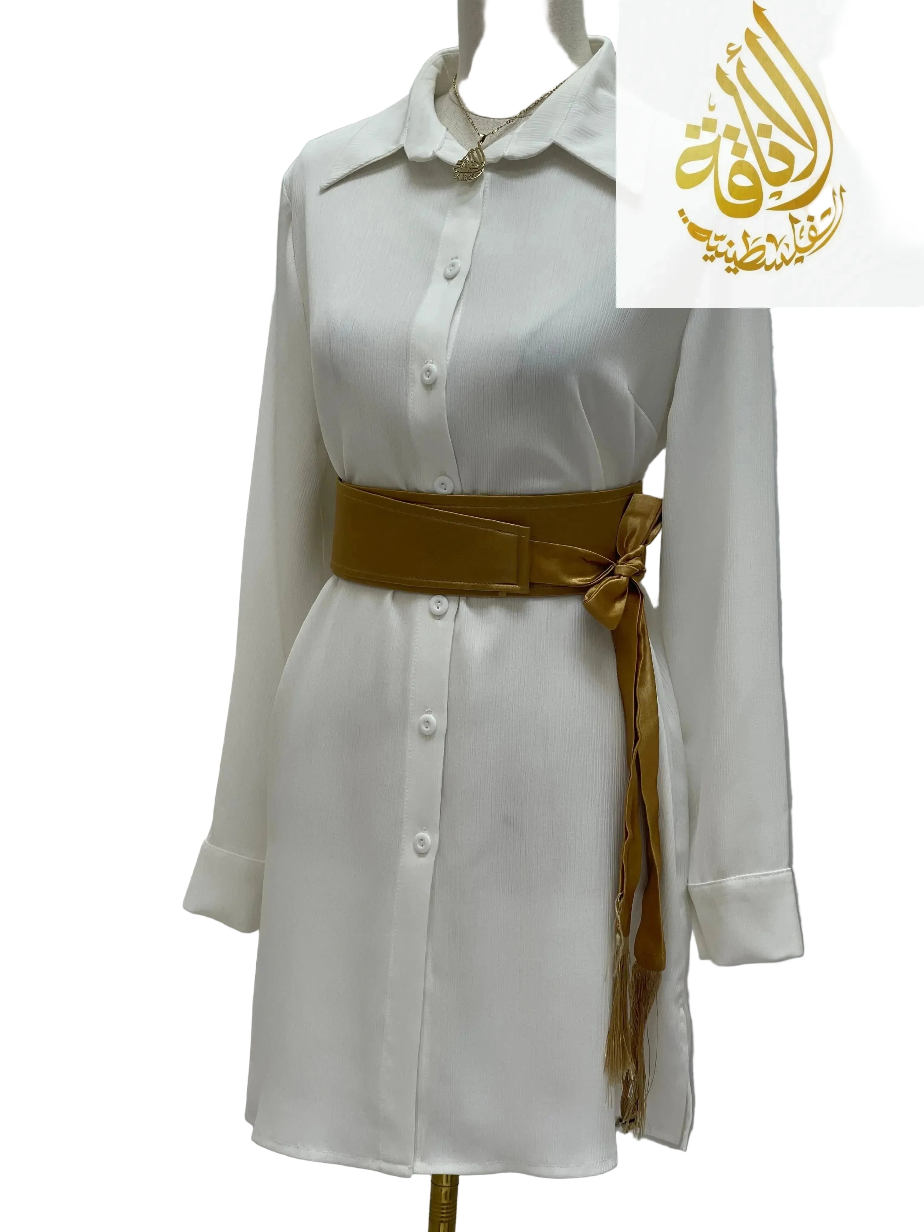 Palestinian Elegance satin belt for dresses in gold wrapped around white button-up shirt dress