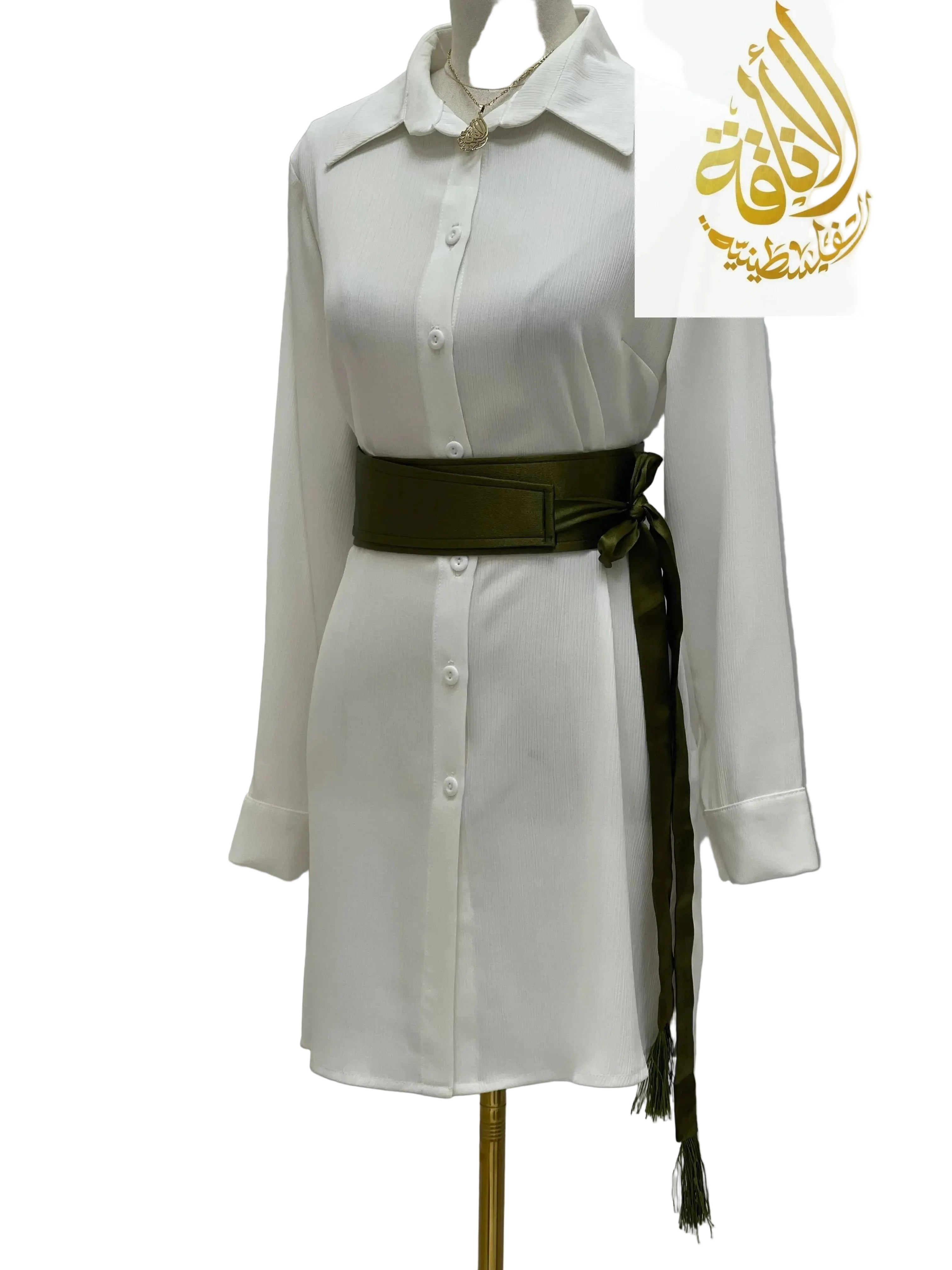 Olive green satin belt for dresses styled on white button-down shirt dress with long sleeves