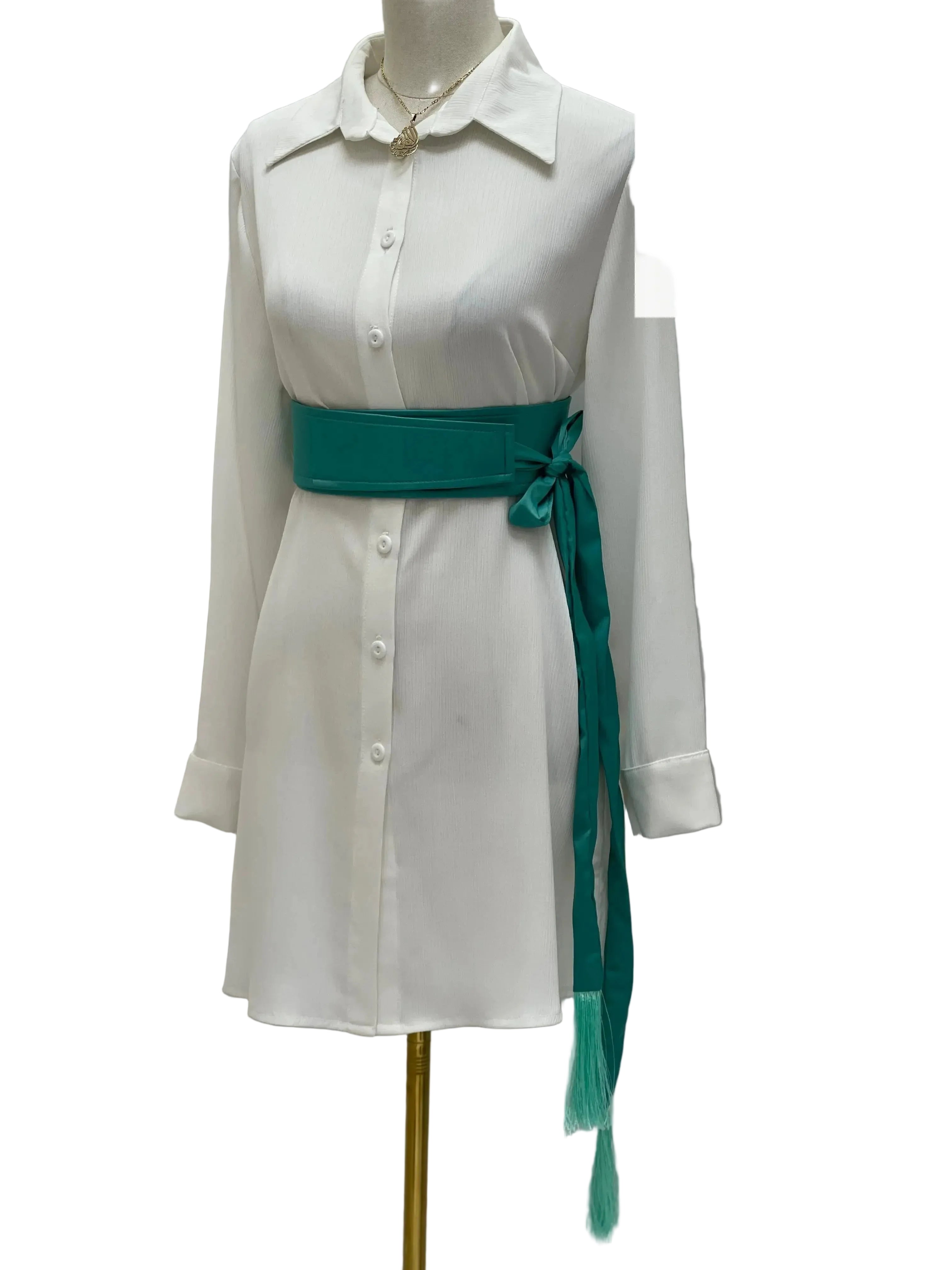 Satin belt for dresses in teal tied around white button-down dress on mannequin