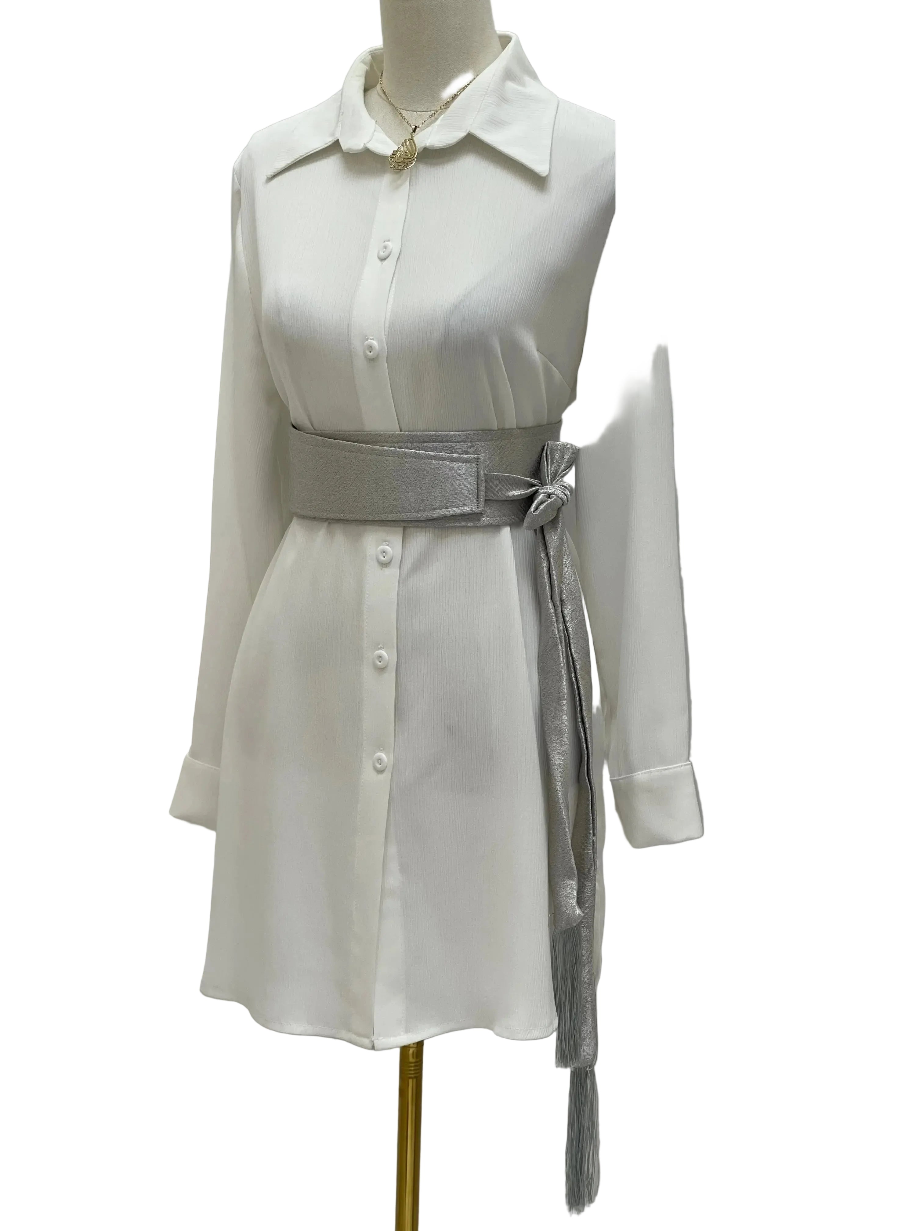 Palestinian Elegance white dress styled with silver satin belt for dresses tied at the waist