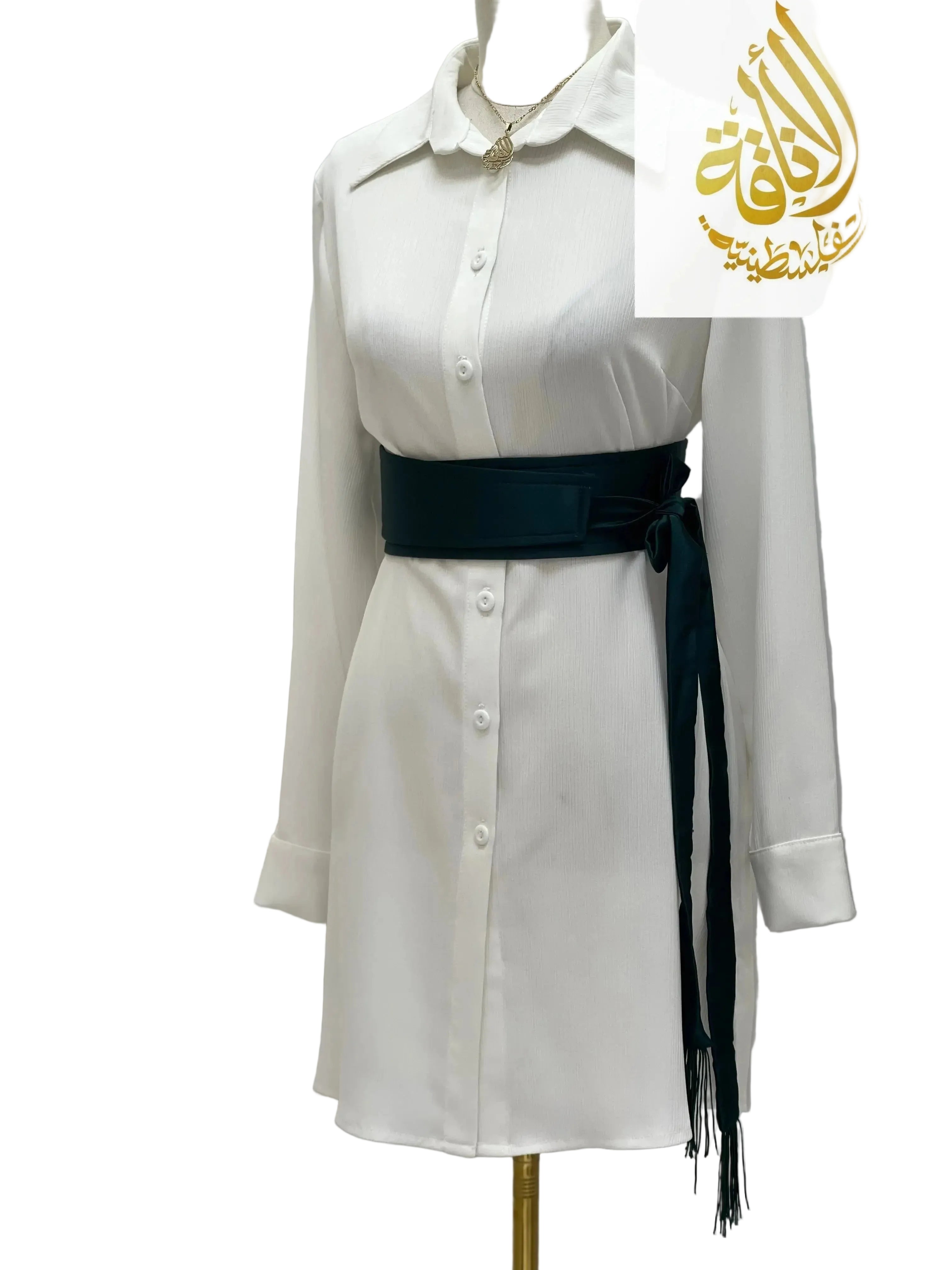 Palestinian Elegance black satin belt for dresses styled on white button down dress with long sleeves