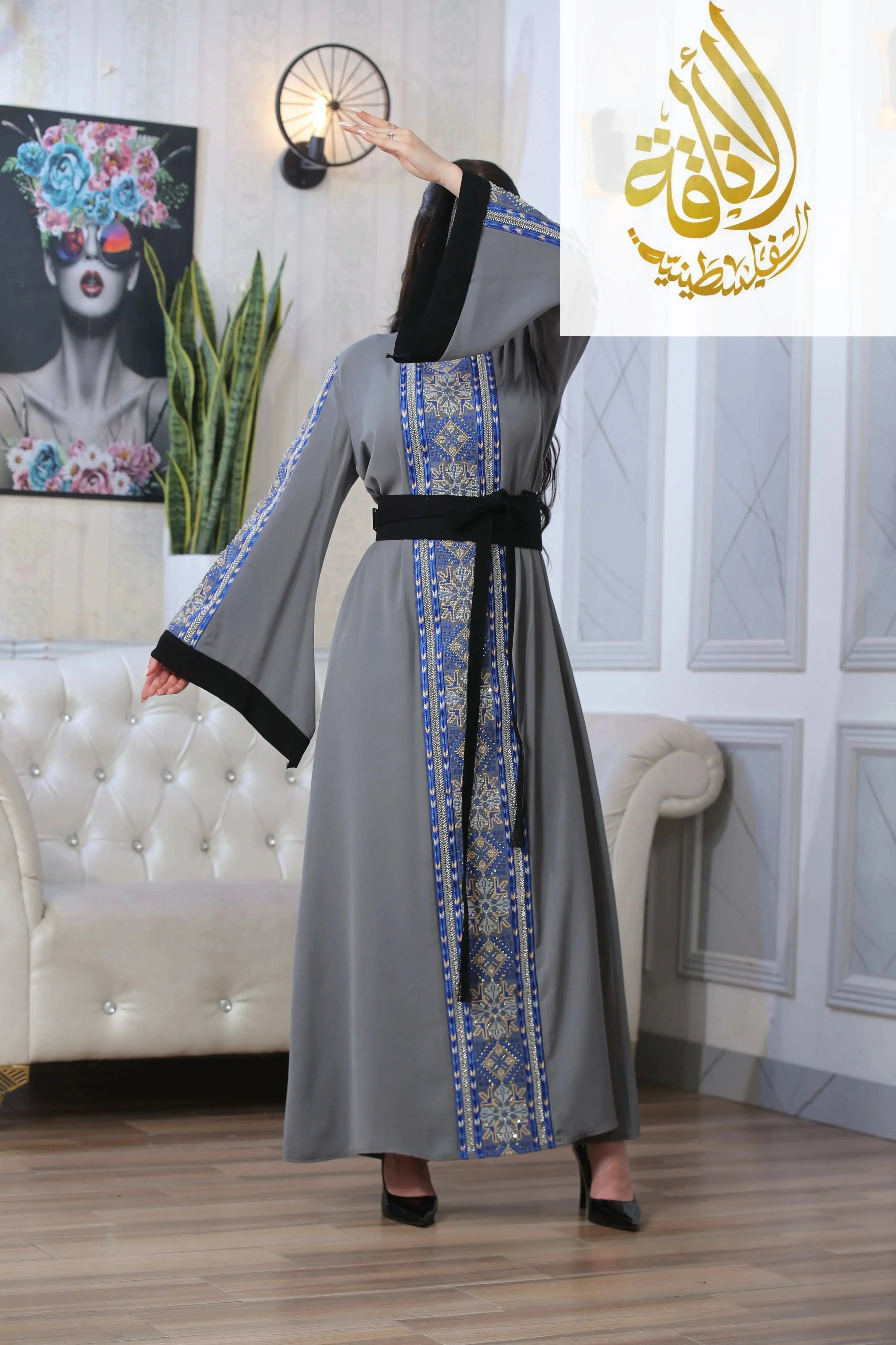 Moroccan Rana Jalabia Thoub by Palestinian Elegance in gray with blue embroidered details and black trim