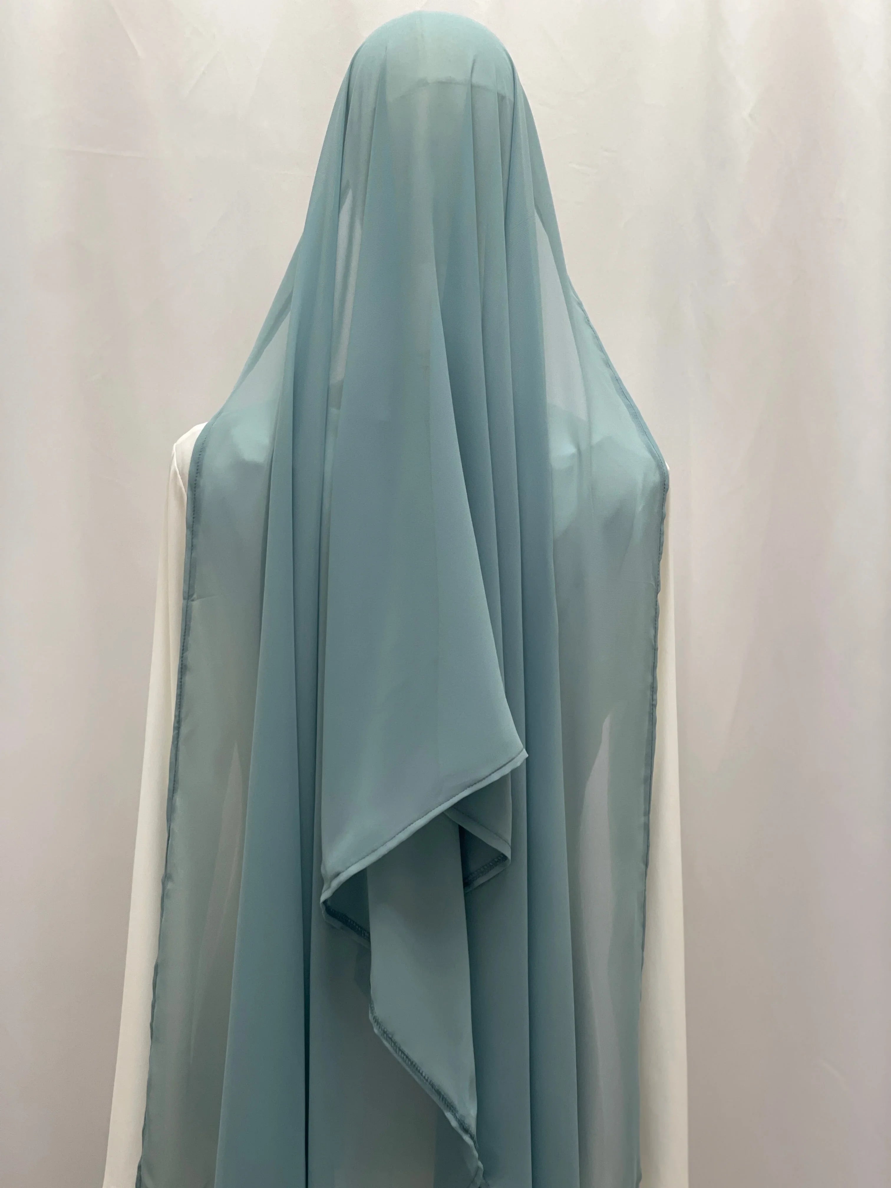 New Khirka With White tassel light blue sheer Palestinian Elegance khirka draped on mannequin