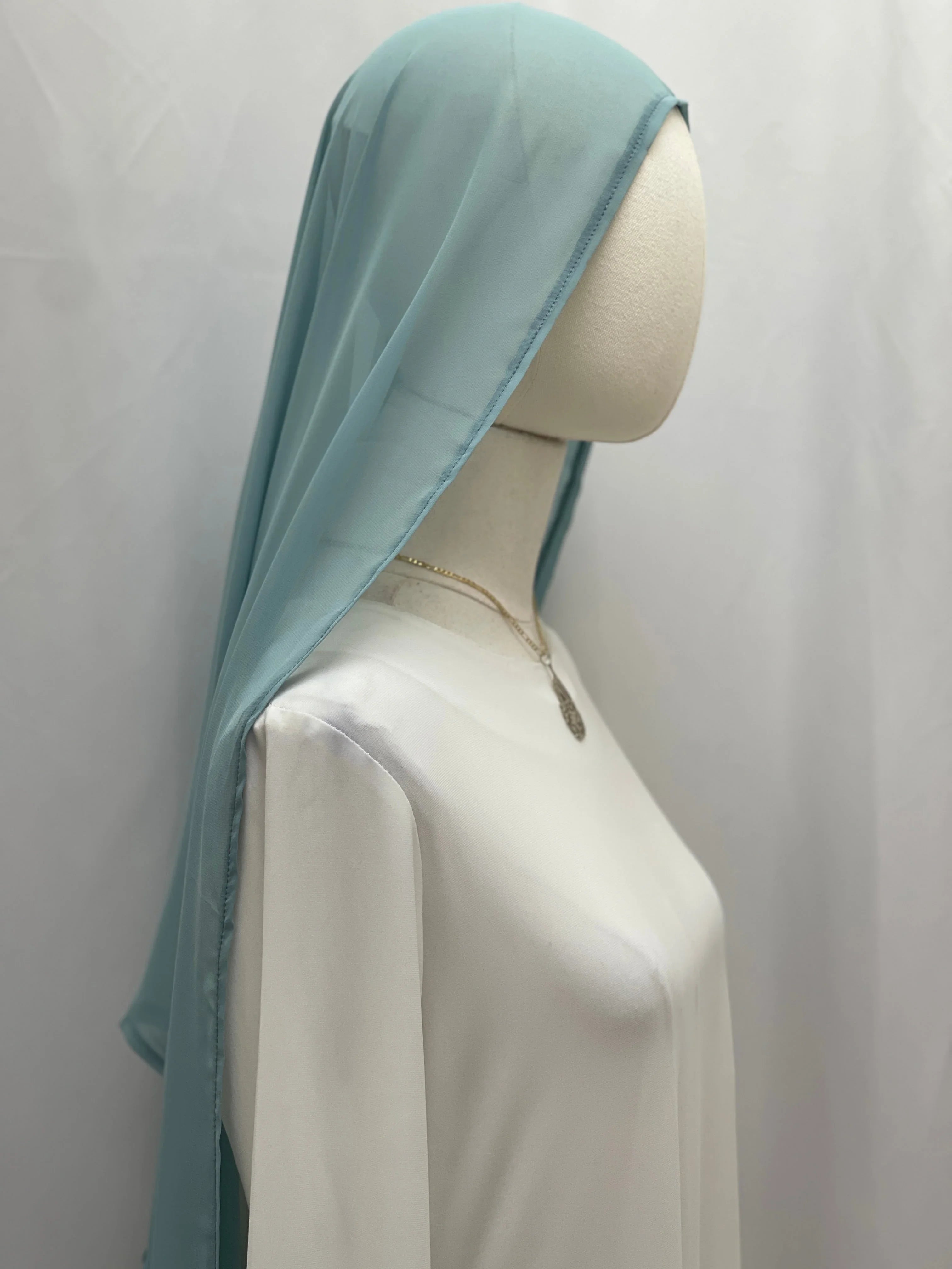 New Khirka With White tassel Palestinian Elegance light teal chiffon drape over mannequin for modest wear