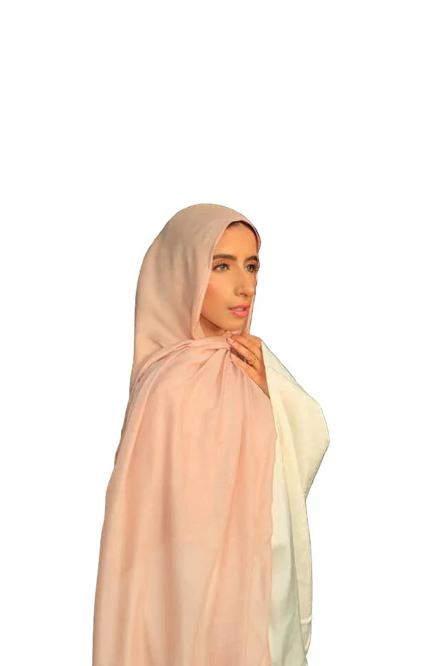 Palestinian Elegance model wearing New Modal Hijab in soft peach beige drape lightweight breathable fabric