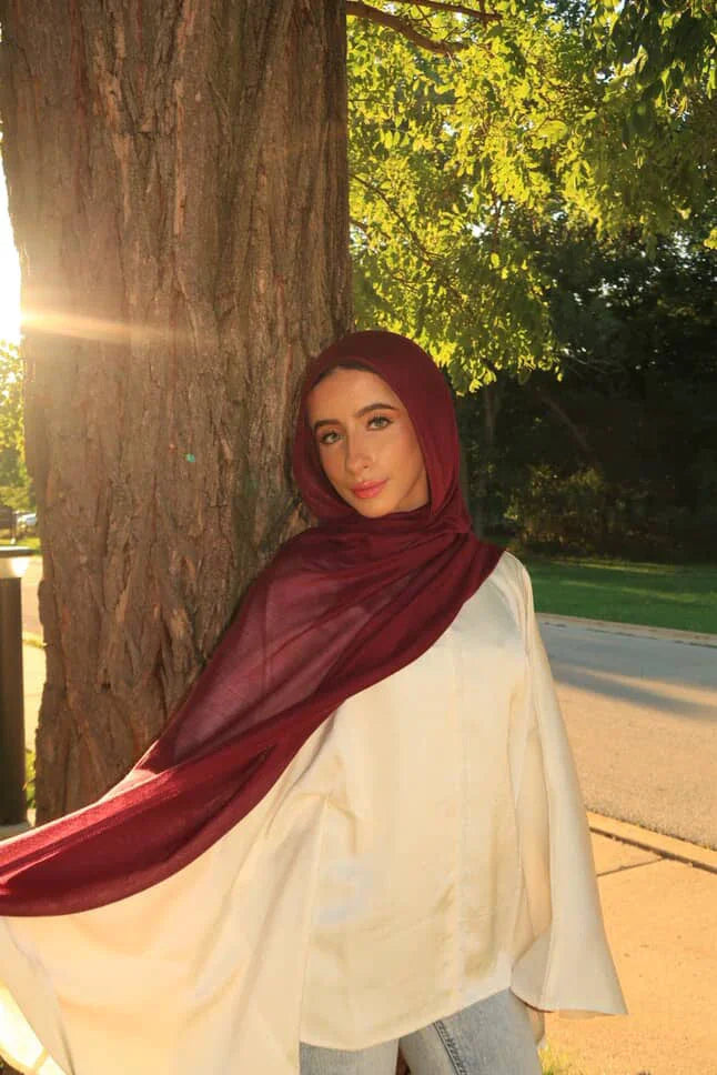 Palestinian Elegance New Modal Hijab maroon lightweight drape on model outdoors with soft flow