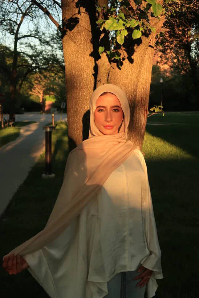 Palestinian Elegance New Modal Hijab beige lightweight draped on model outdoors at golden hour by tree