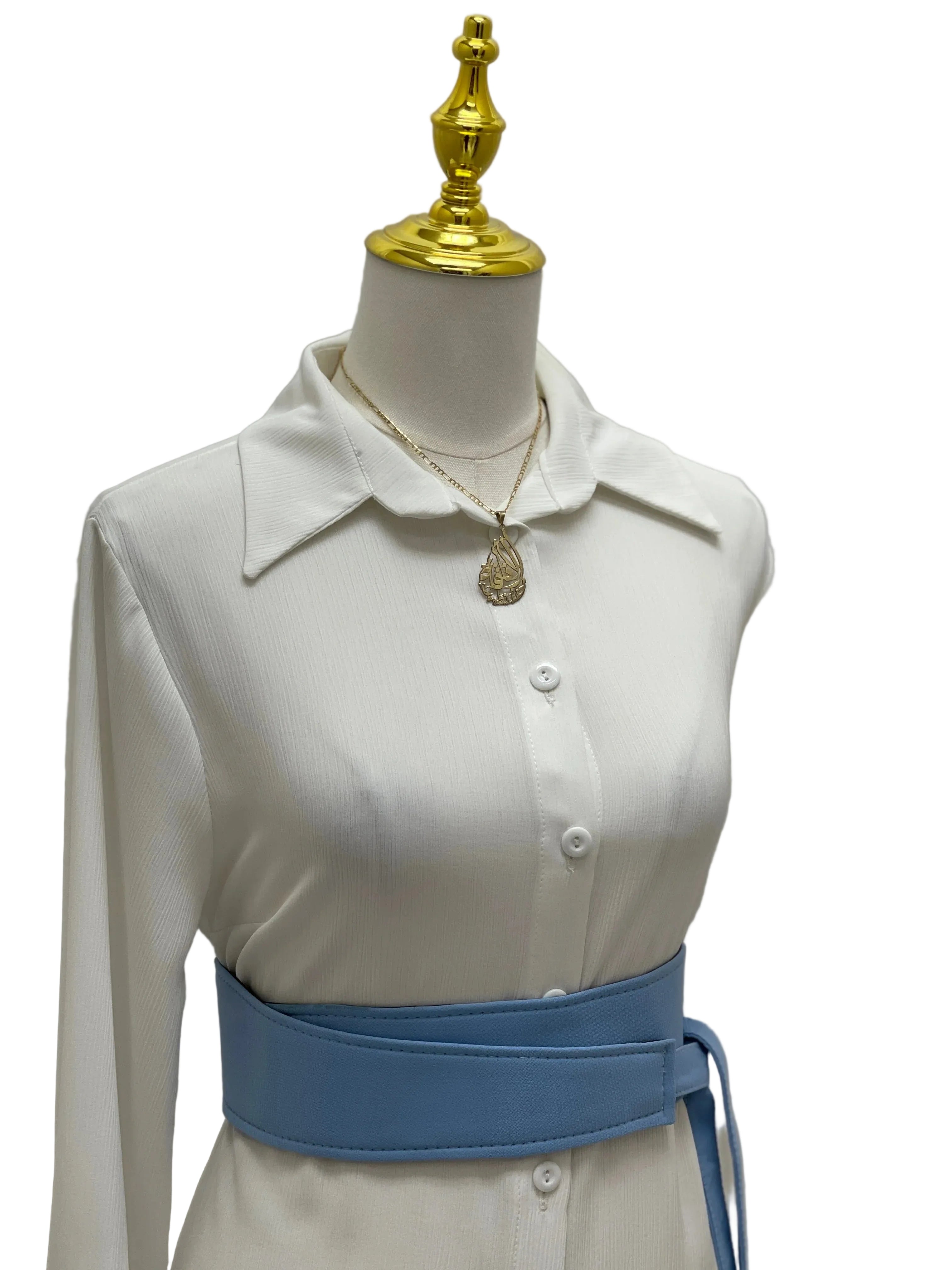 Palestinian Elegance Satin Belt Matt Color sky blue wide waist belt styled over white shirt dress on mannequin
