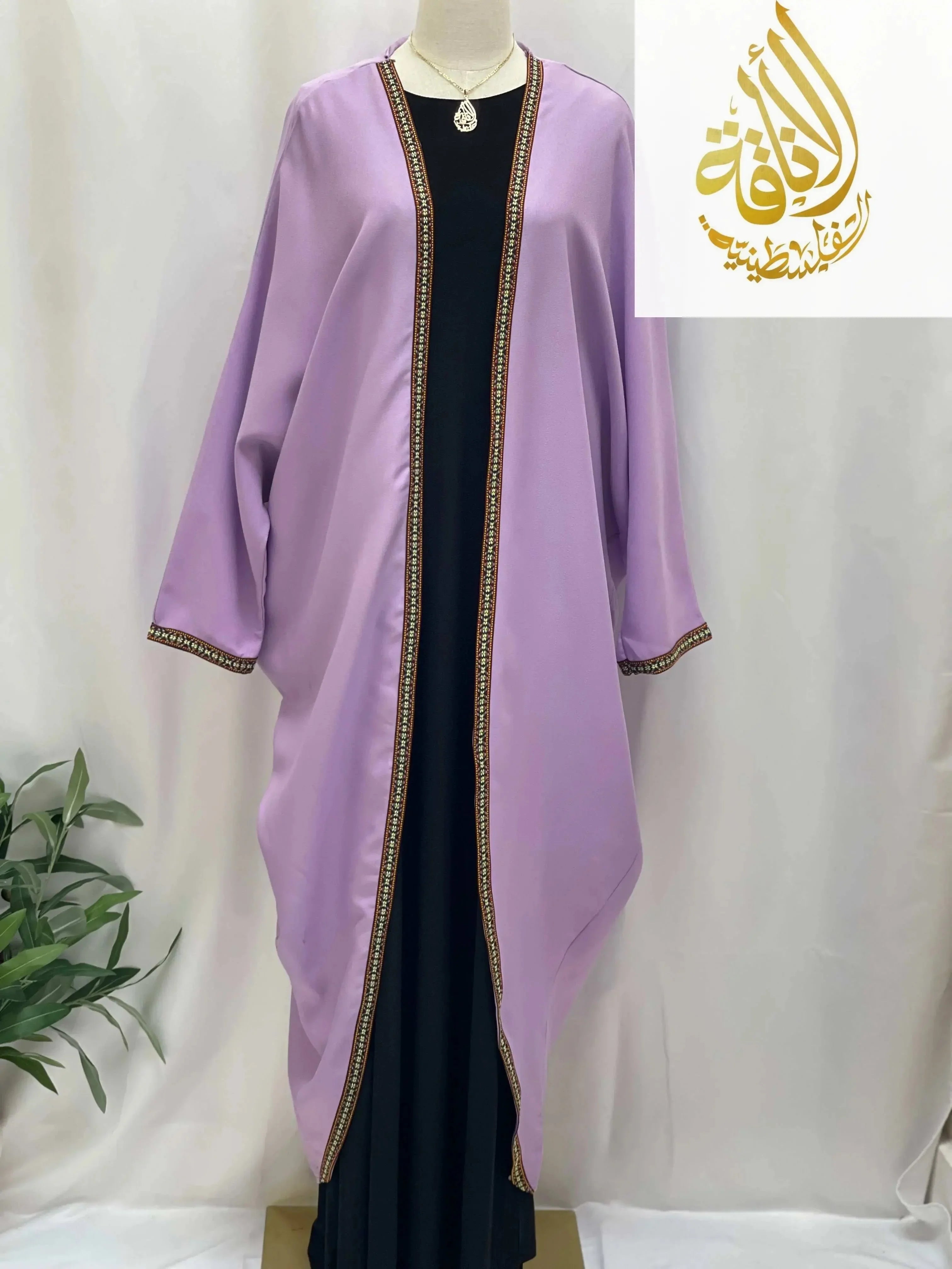 Palestinian Elegance Nijma Free Size kimono lavender cardigan with decorative trim on mannequin