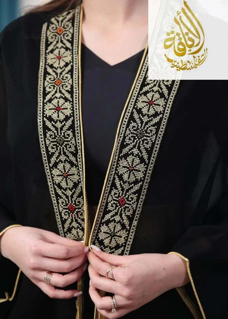 Palestinian Elegance embroidered chiffon cardigan with intricate gold and colored thread detail on black fabric