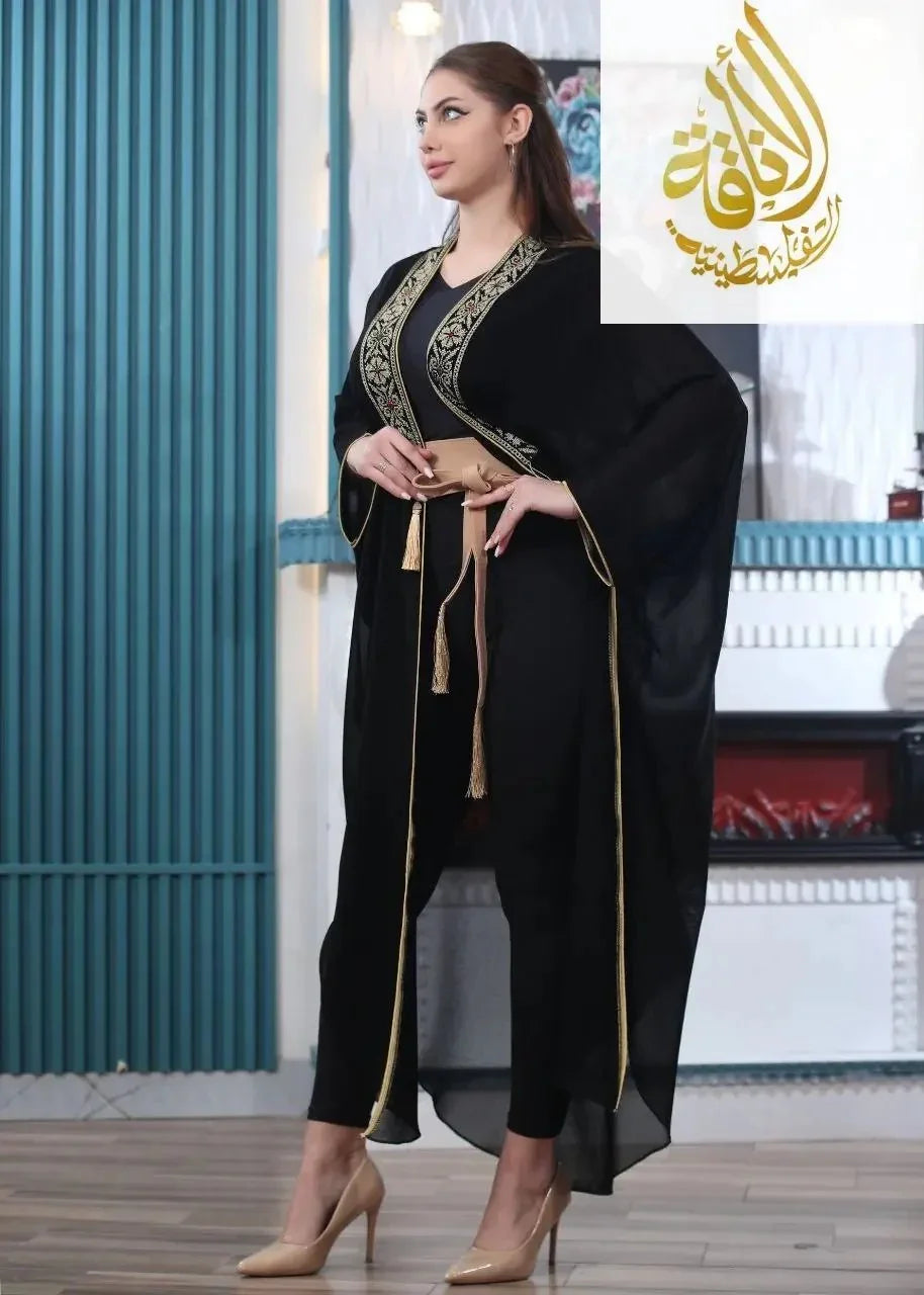 Black embroidered chiffon cardigan by Palestinian Elegance with gold detailing and matching belt