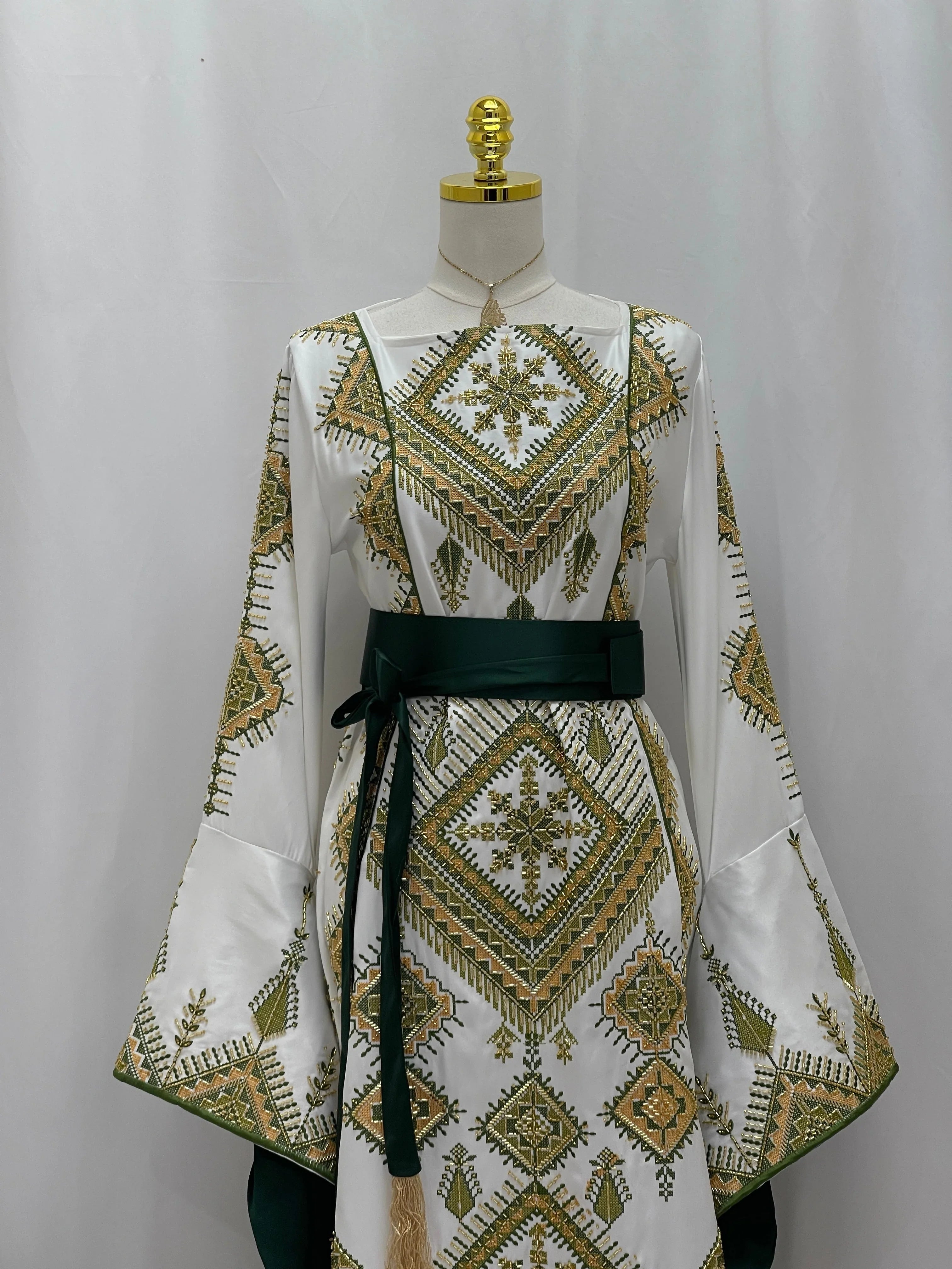 Olive Bloom Bridal Embroidered Dress white gown with green and gold embroidery bell sleeves and dark green sash