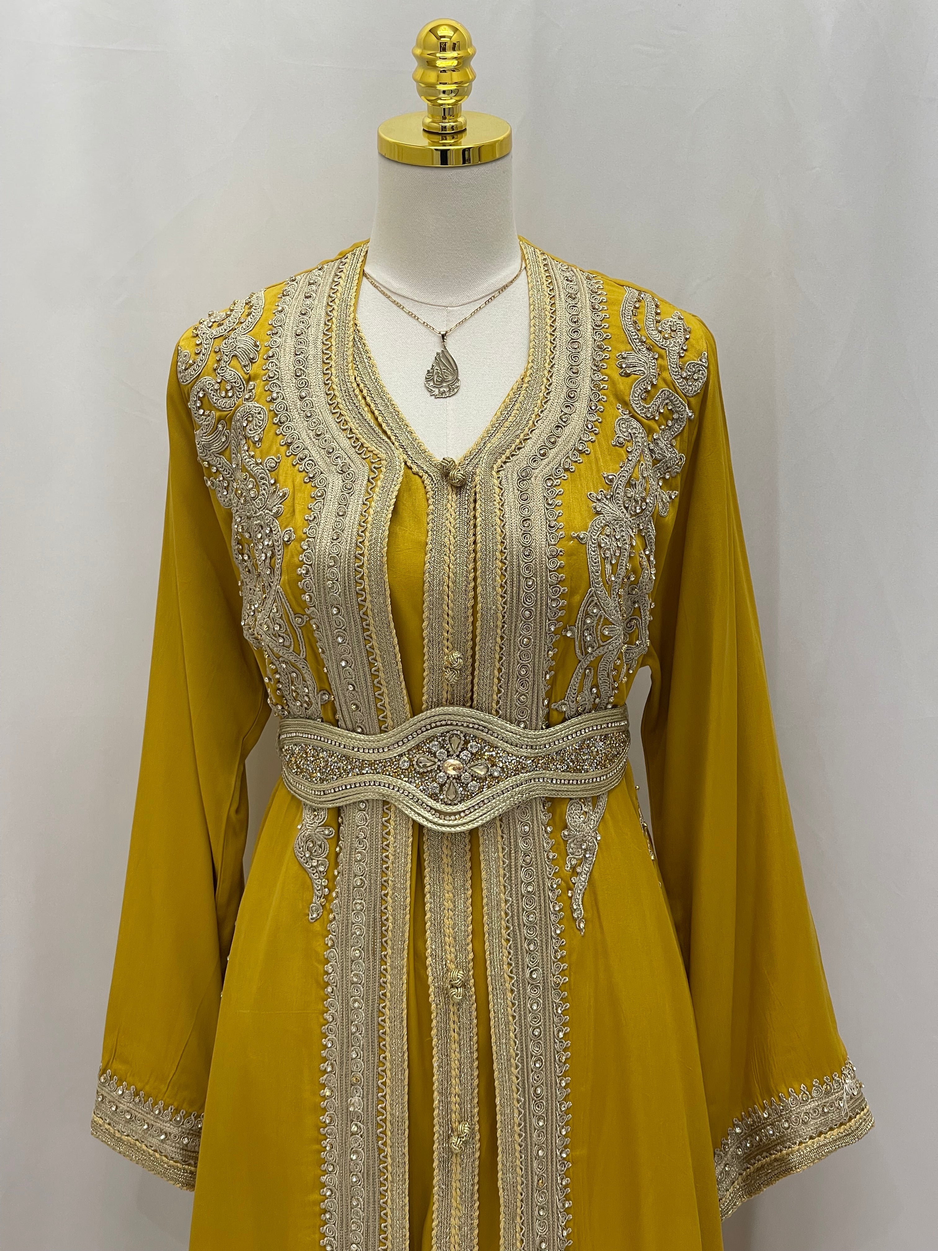 Omima Morocco Style Kaftan by Palestinian Elegance in yellow with intricate silver embroidery and matching belt