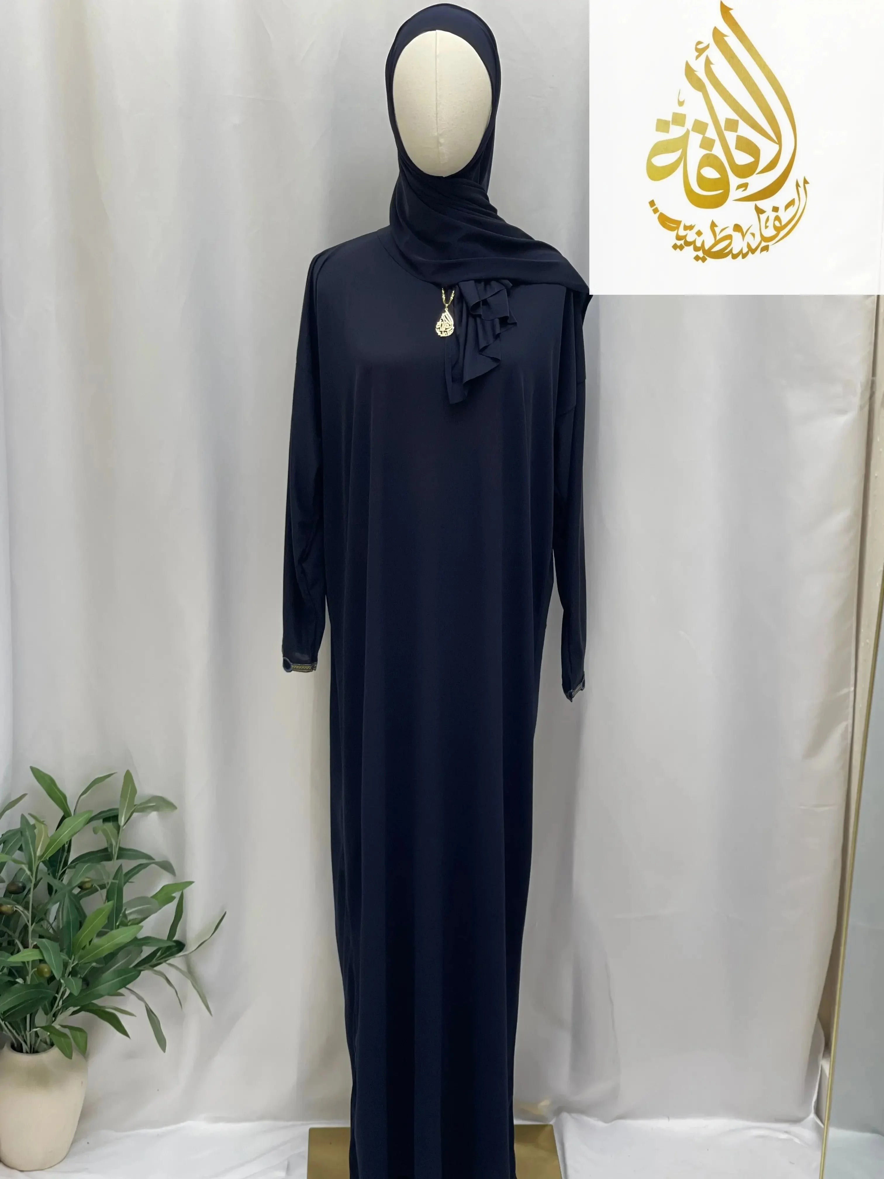 Palestinian Elegance comfortable one piece prayer dress in black with long sleeves and matching hijab