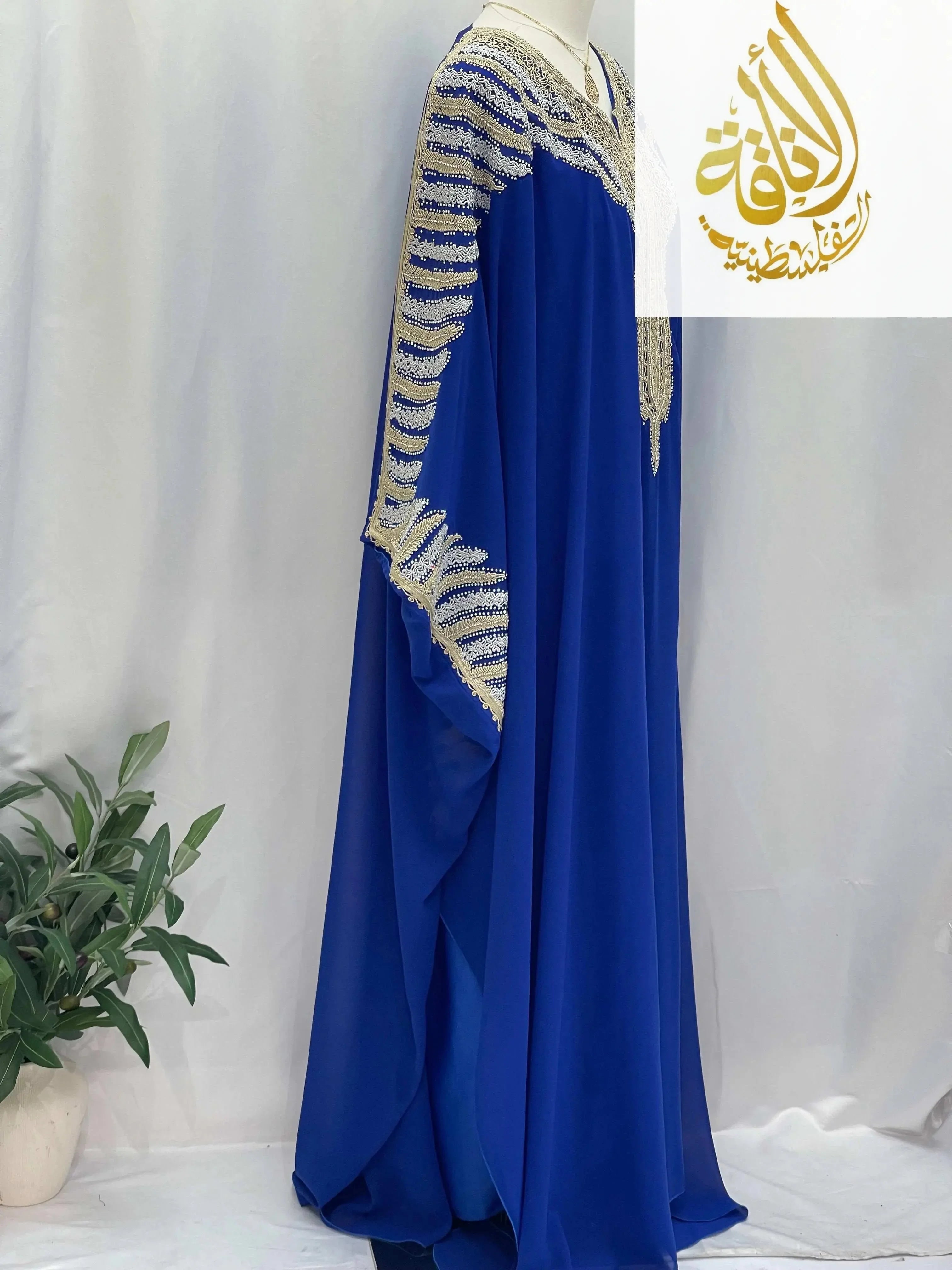 Dana Free Size Kaftan Abaya in royal blue with intricate gold embroidery on sleeves and neckline by Palestinian Elegance